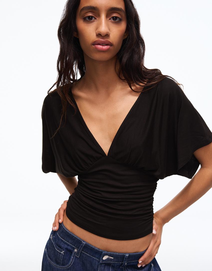 Shirt mit V-Ausschnitt und Raffungen-Schwarz