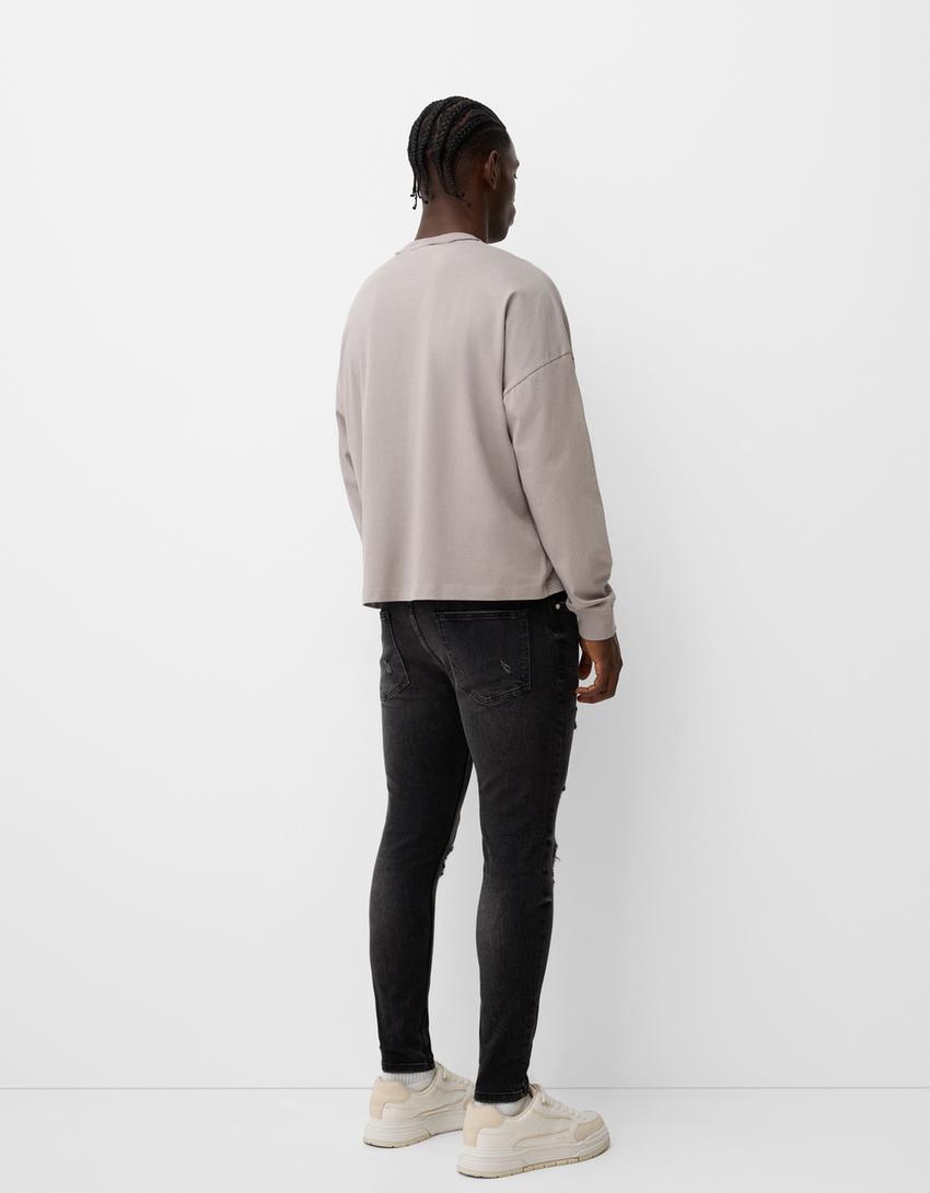 Super Skinny Jeans mit Rissen-Schwarz