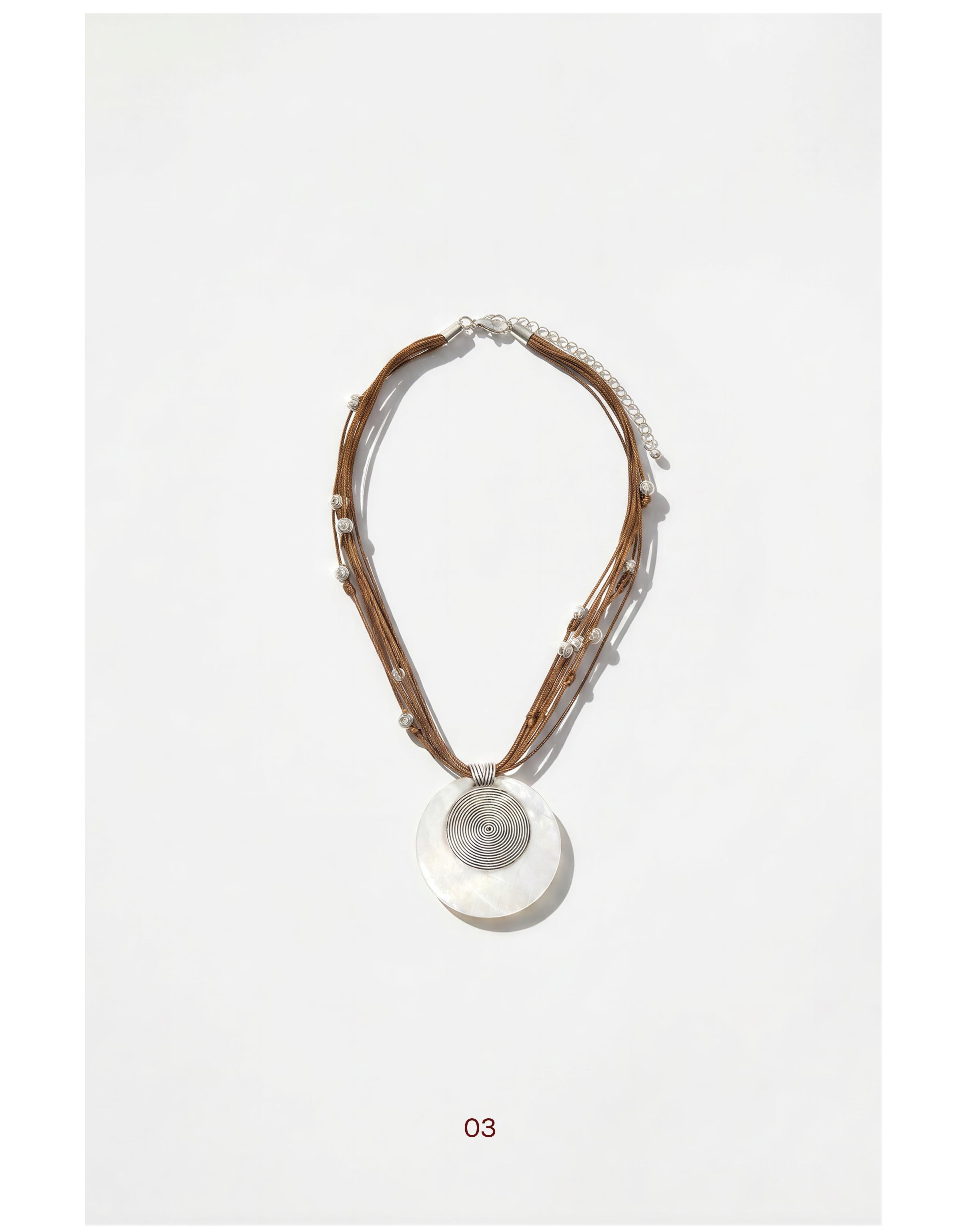 Spiral cord necklace — Cream