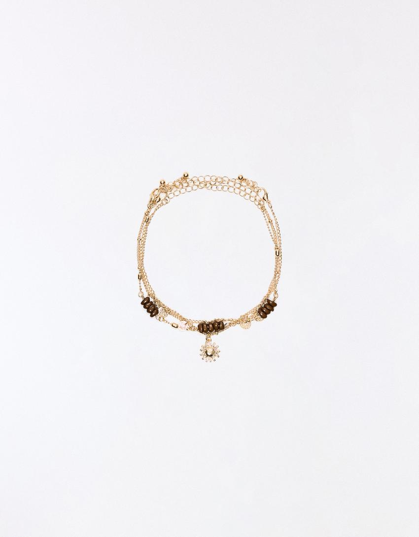 Pack of beaded anklets-Gold
