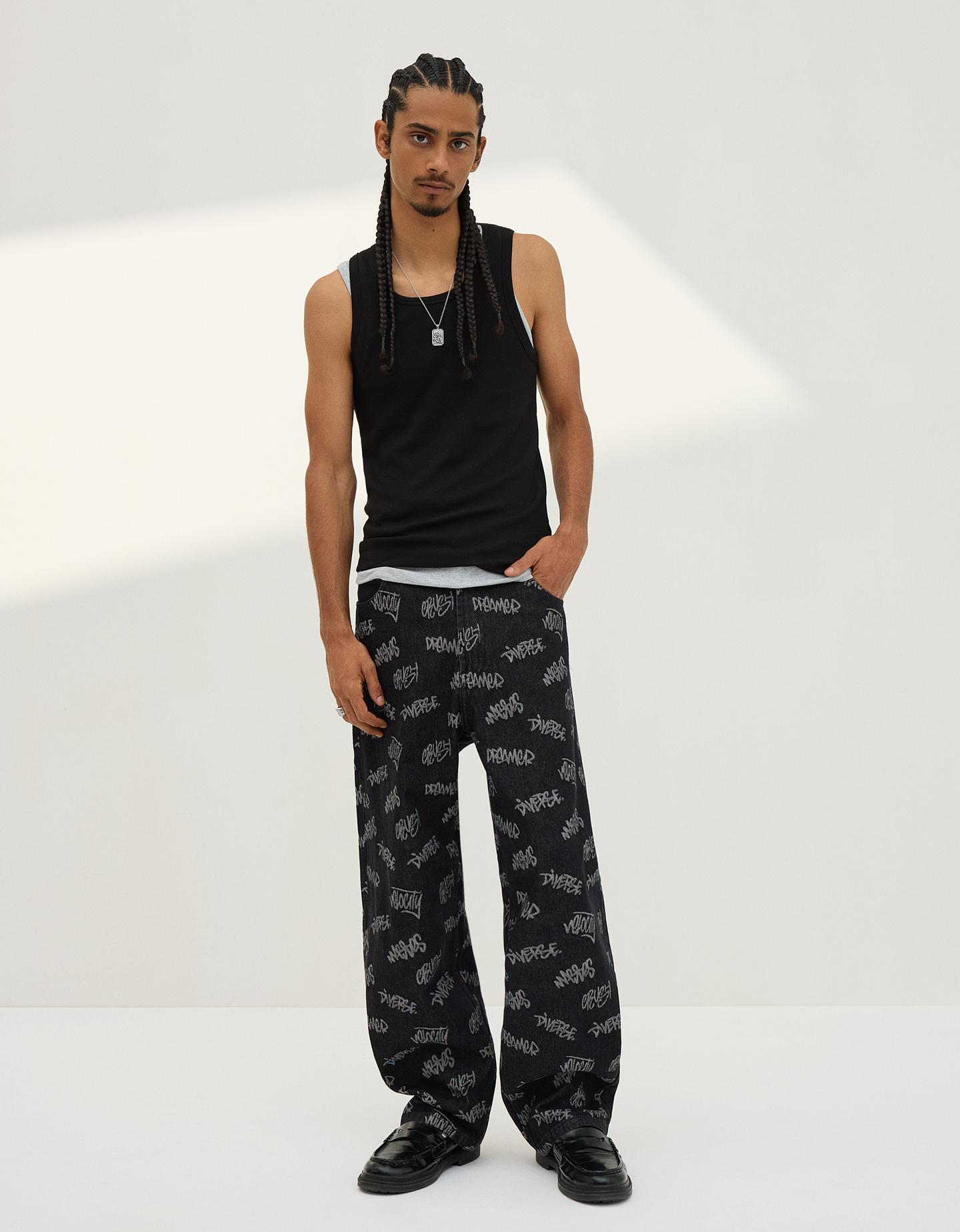 Bershka jeansy o kroju baggy z żakardowym wzorem czarny