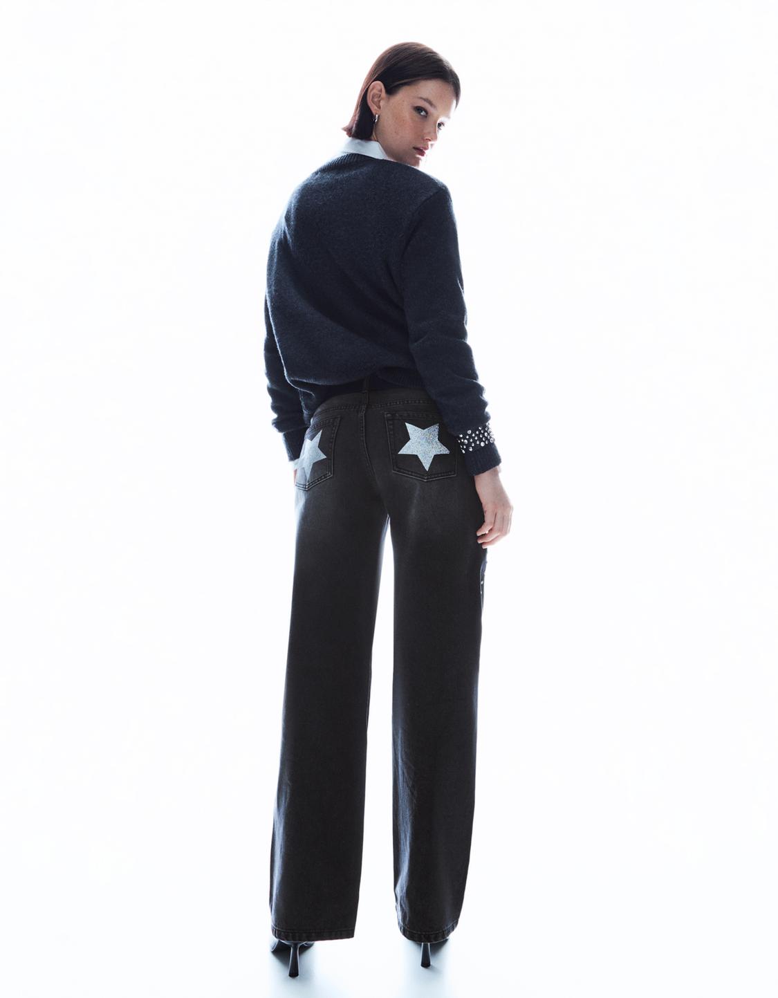 Baggy jeans with stud and star pockets