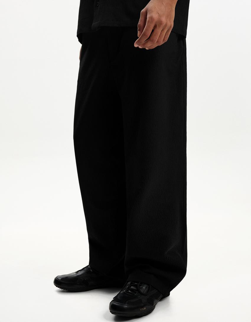 Pantalon baggy jogger plissé