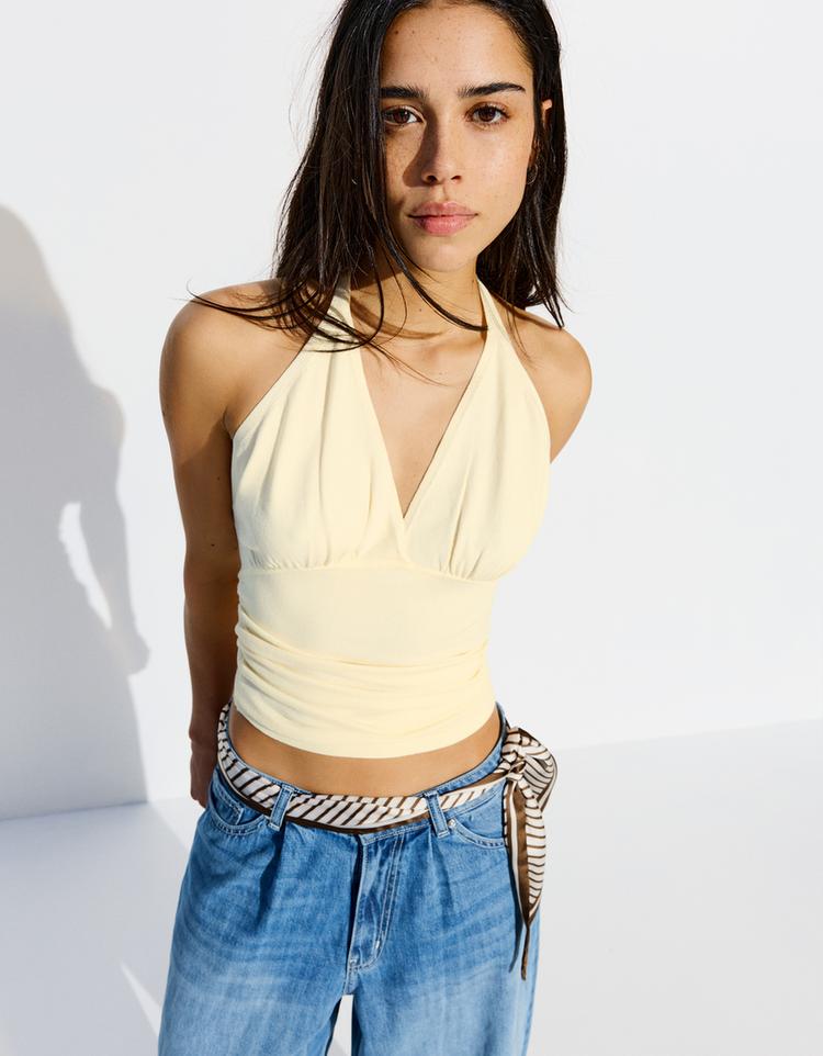 Büzgülü halter top
