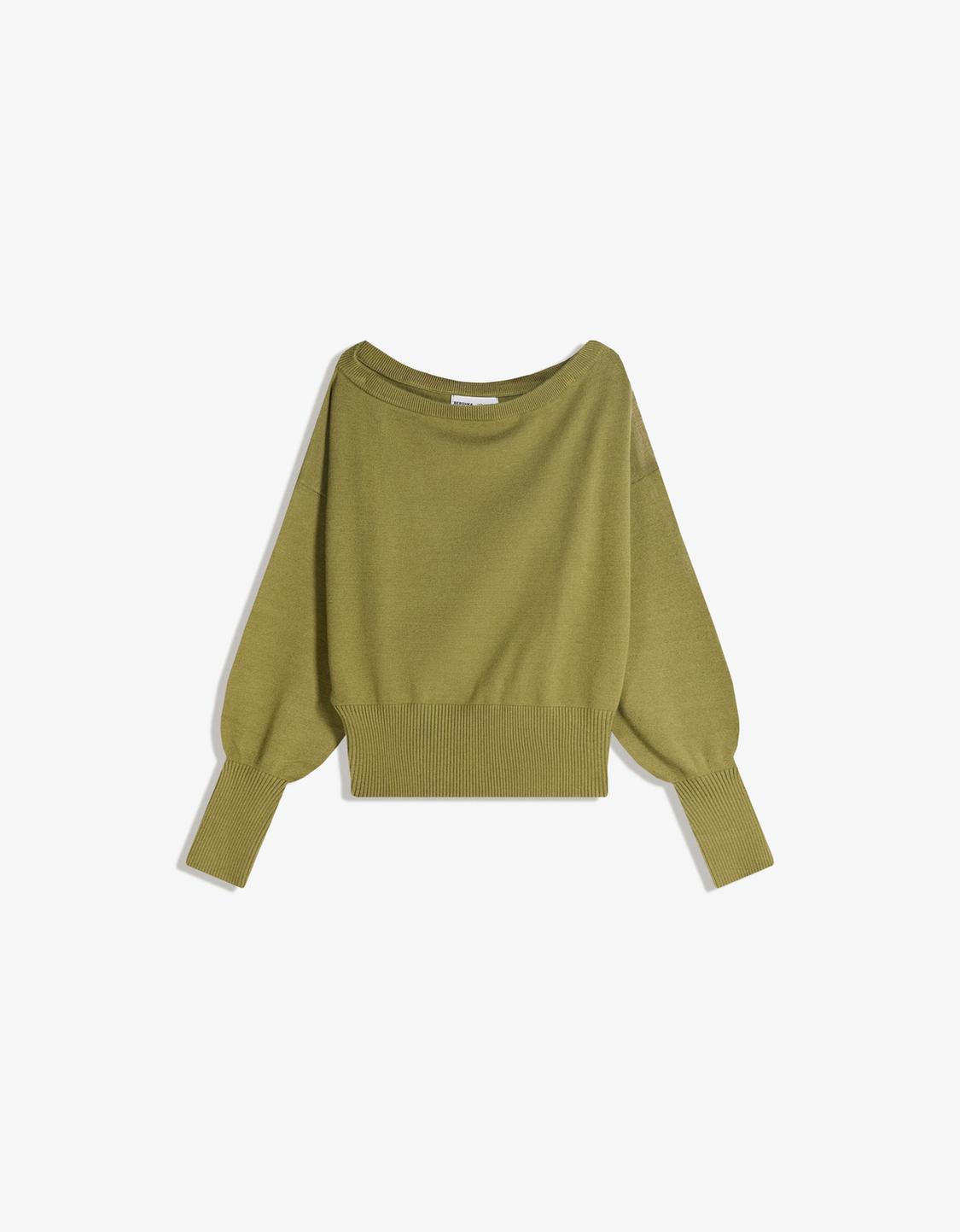 Asymmetric sweater with ribbed hem