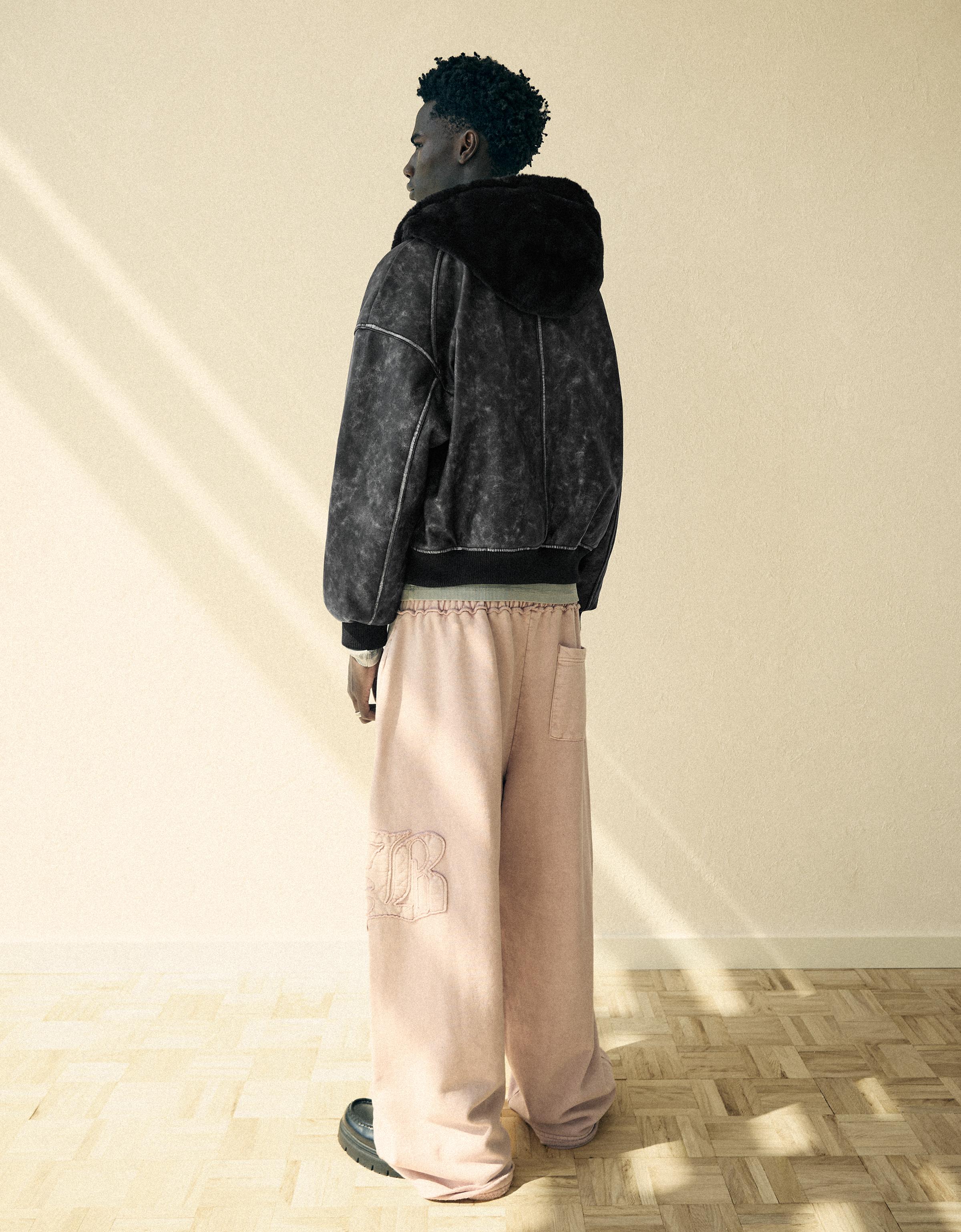 Reversible faux fur hooded jacket — Black
