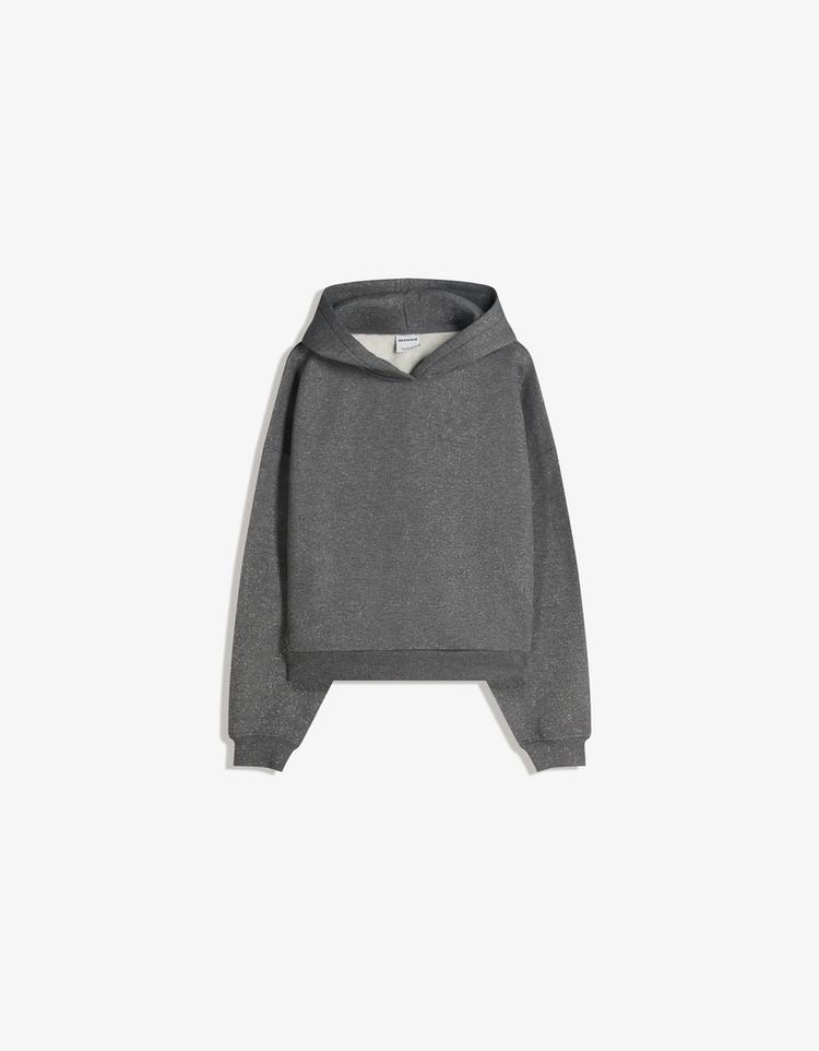 Sweatshirt com capuz e purpurina