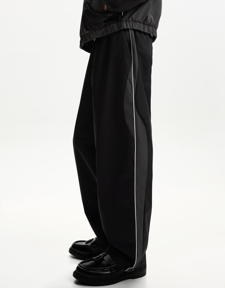 Technical trousers with sporty trim-Black-2