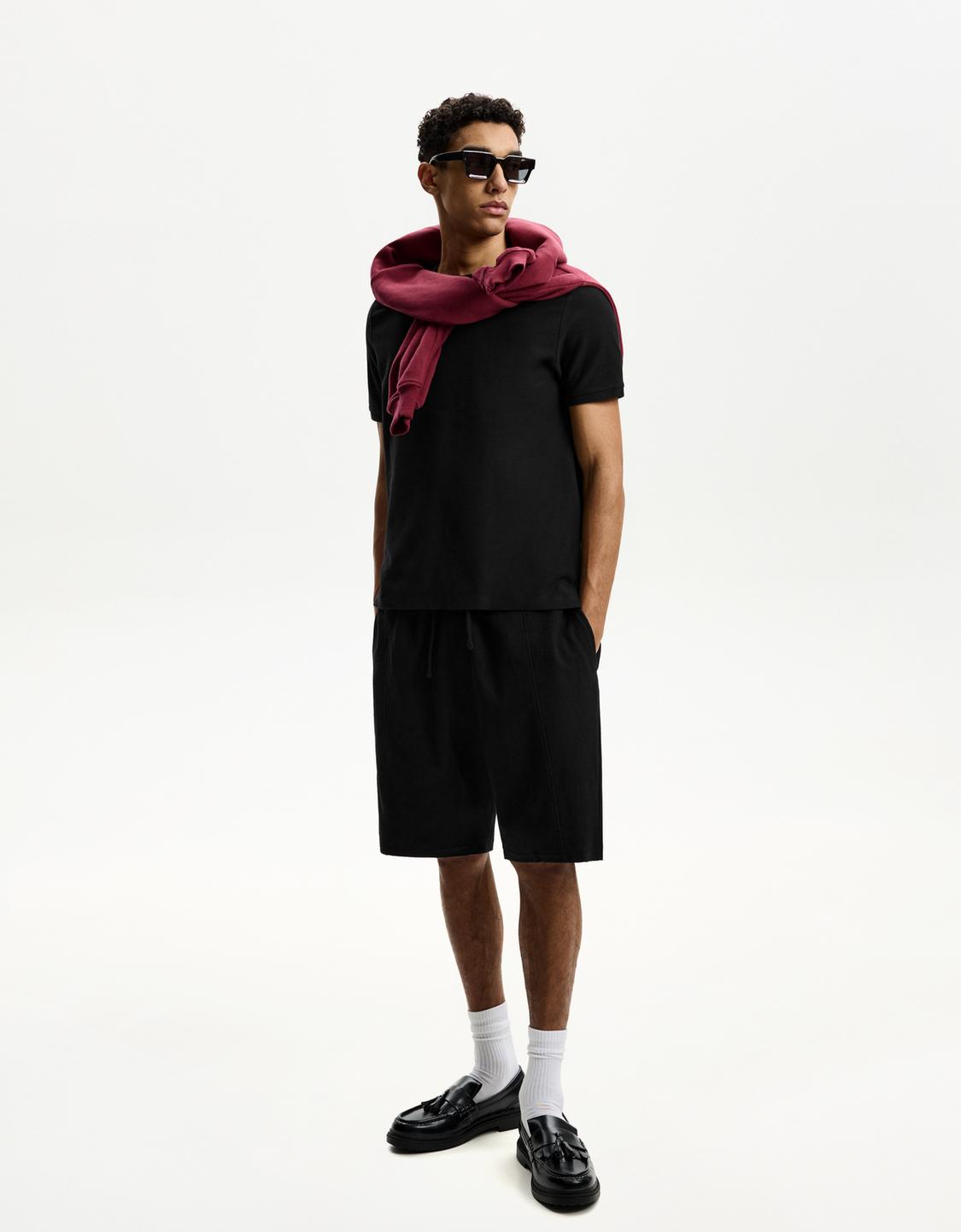 T-shirt and Bermuda shorts set