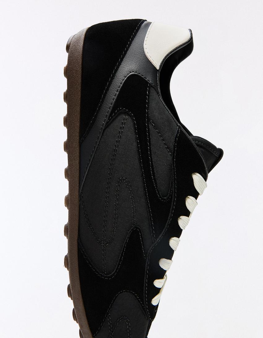 BUTY SPORTOWE RETRO NA CIENKIEJ PODESZWIE-Czarny