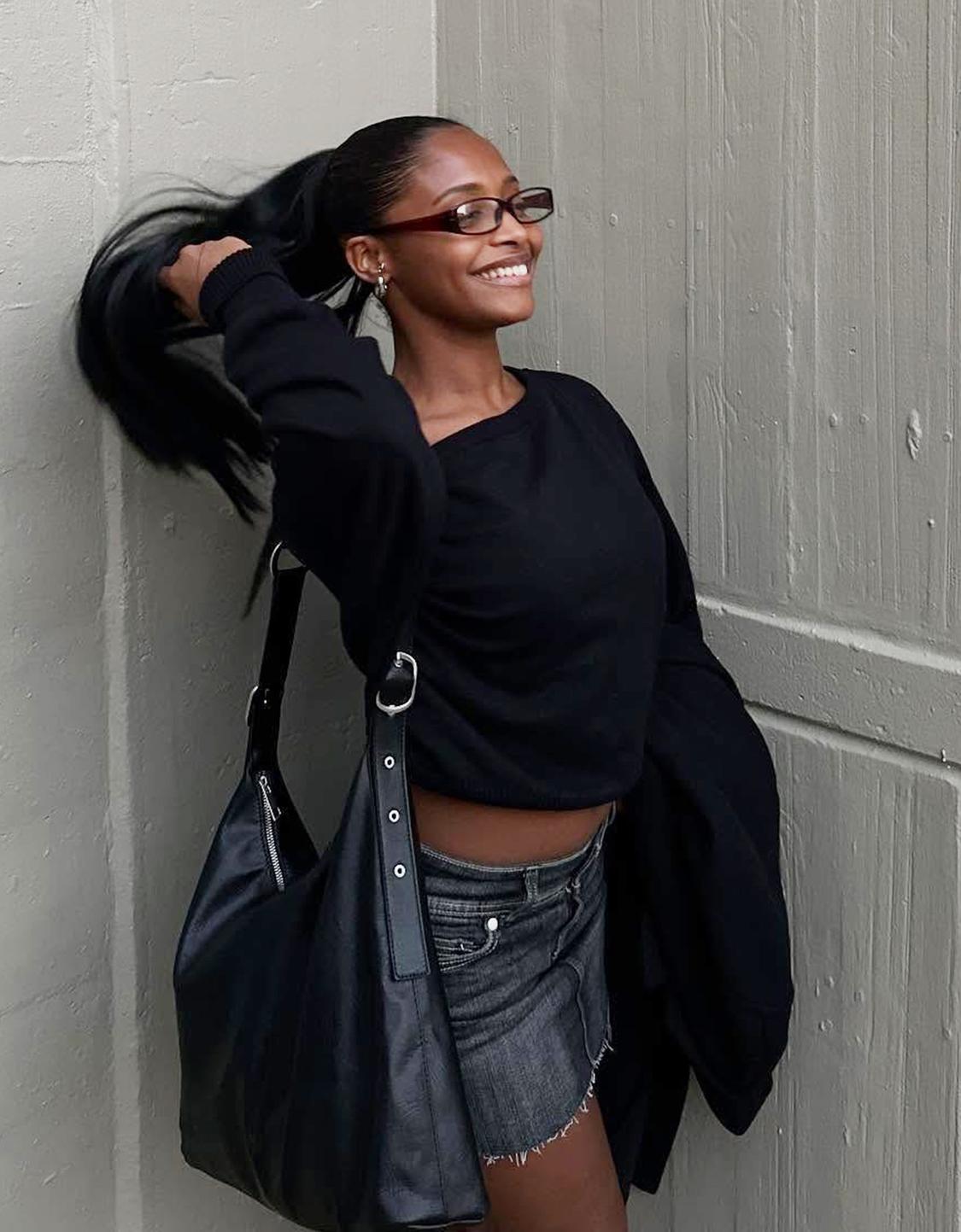 Asymmetric sweater with ribbed hem