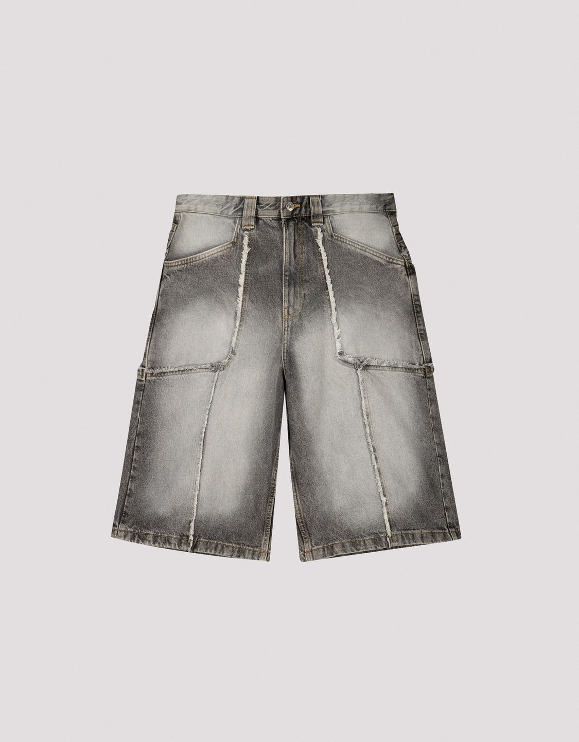 Baggy denim Bermuda shorts with fringing