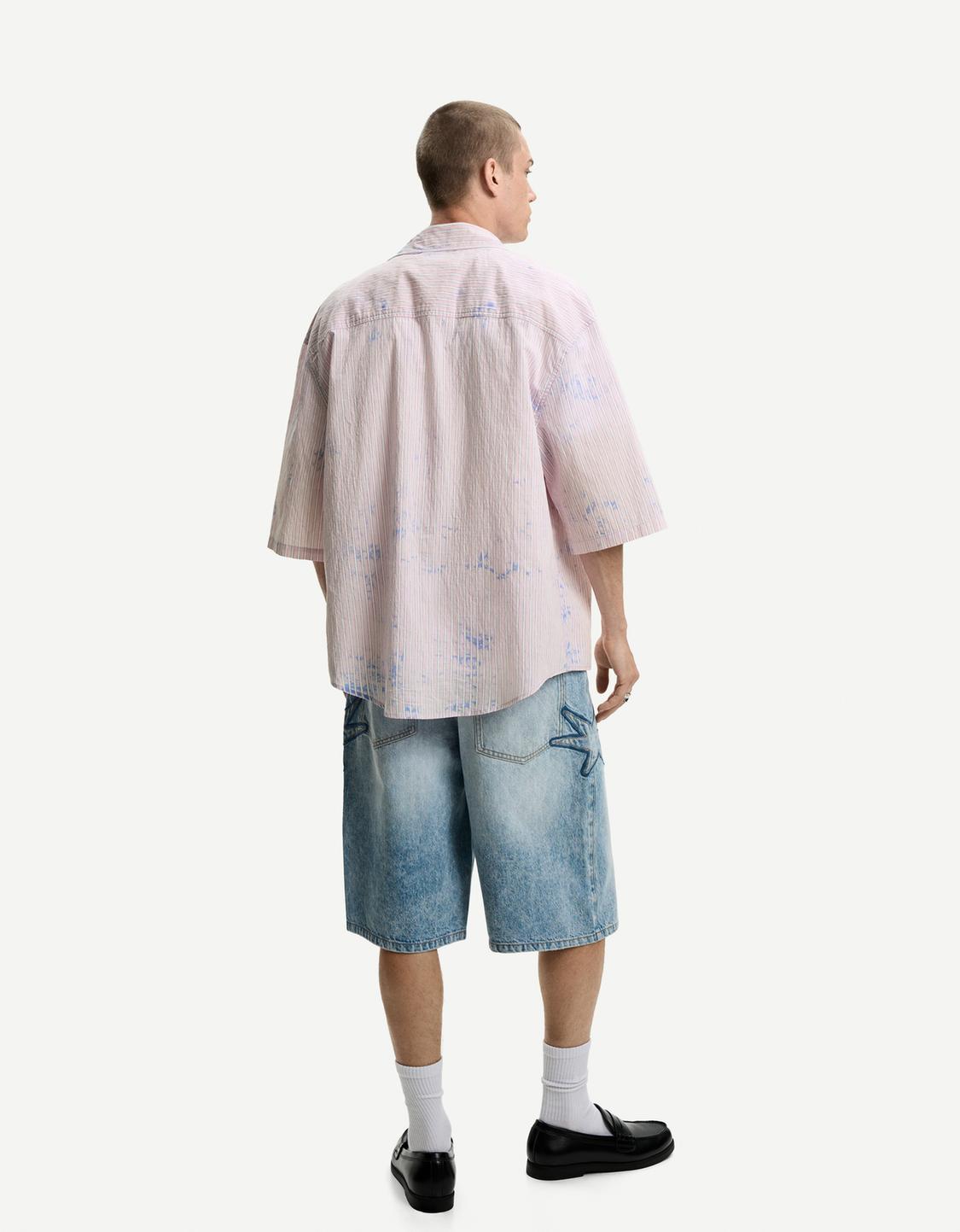 Striped oversize bleached shirt with short sleeves