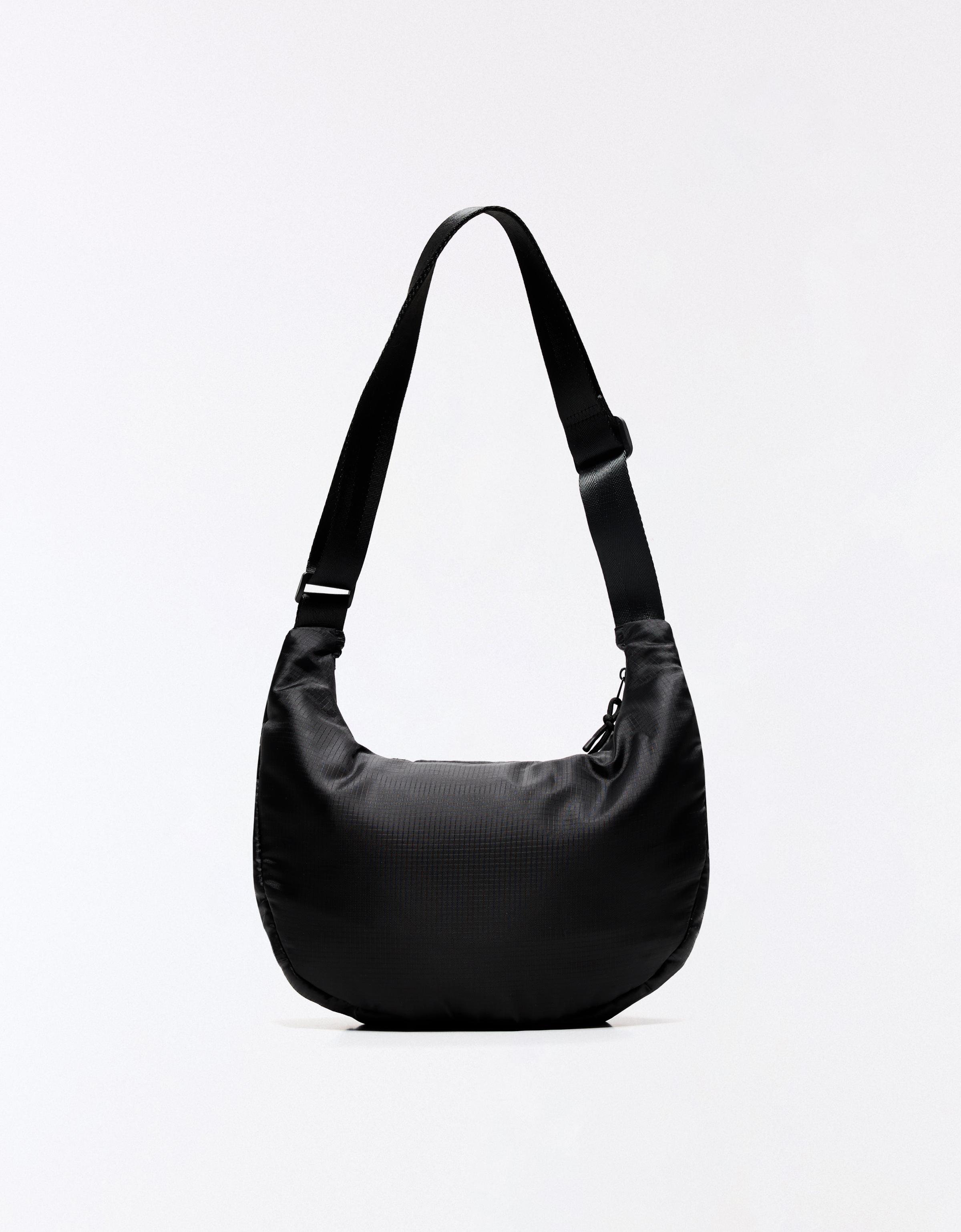 Technical multi-pocket bucket bag — Black
