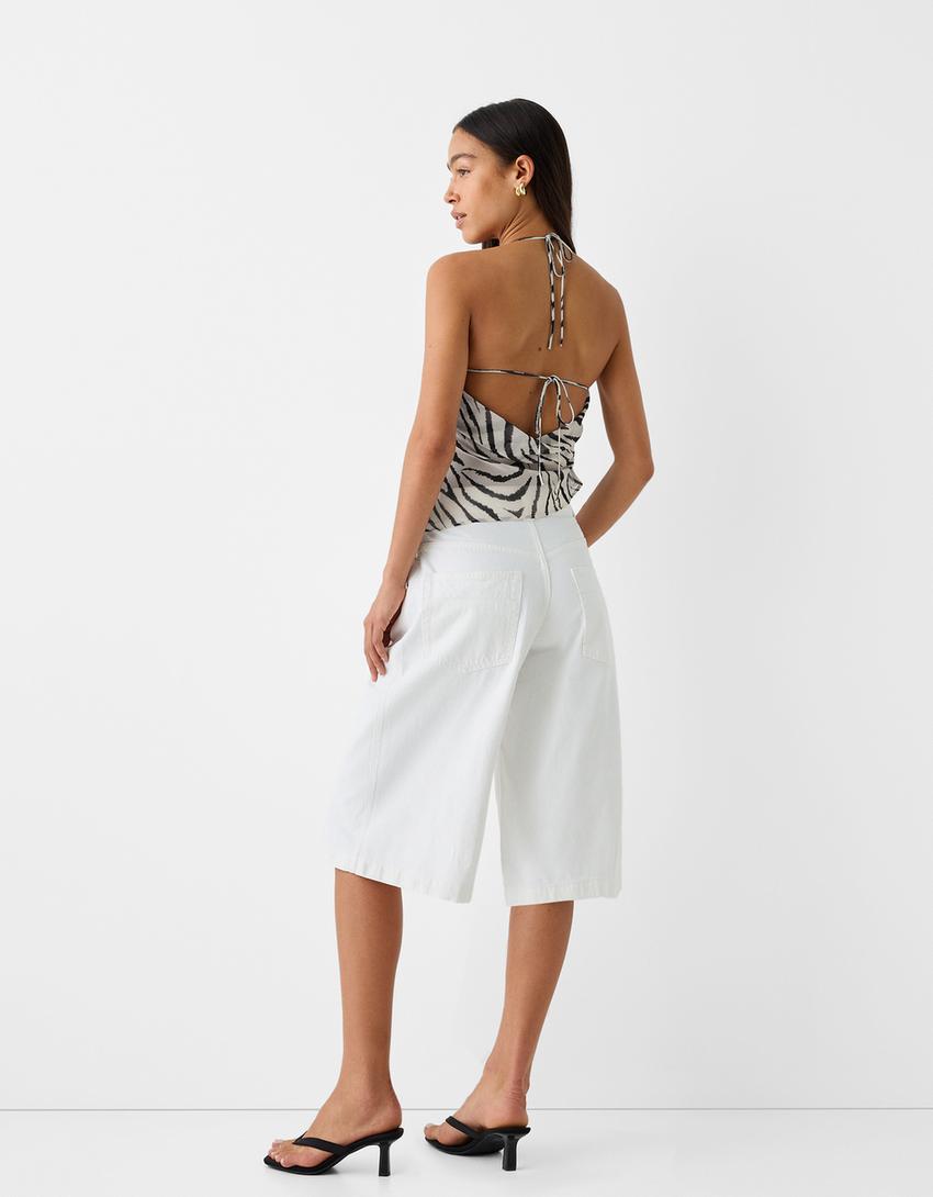 توب قصير غير متماثل بطبعة حيوانية-أبيض / أسود-1