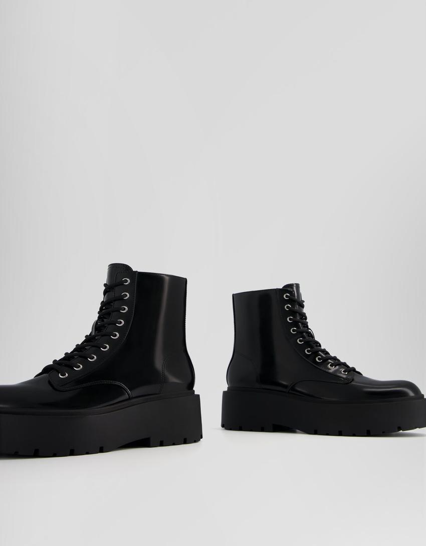 بوت برقبة للكاحل ونعل عال وأربطة-أسود