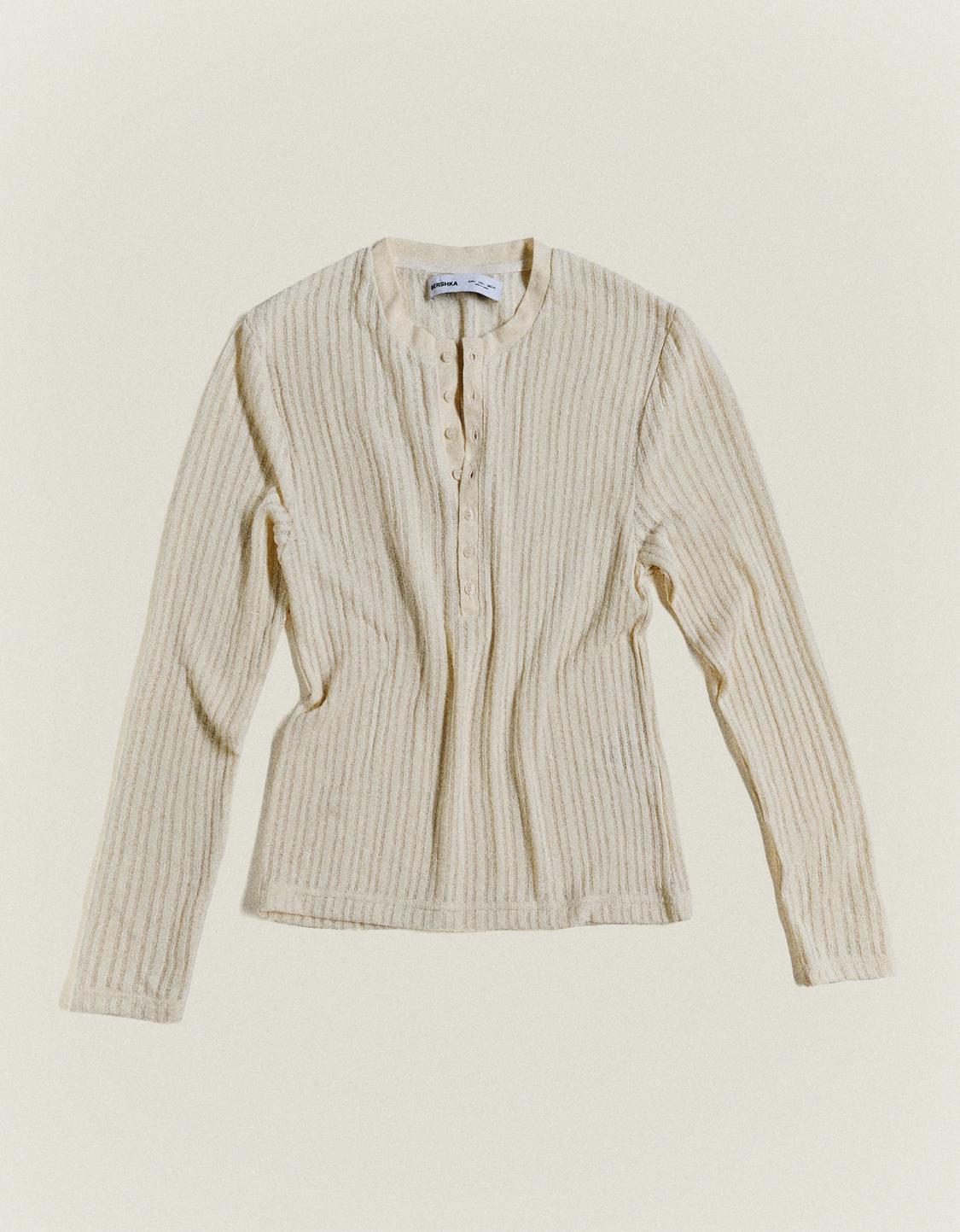 Openwork sweater with buttons