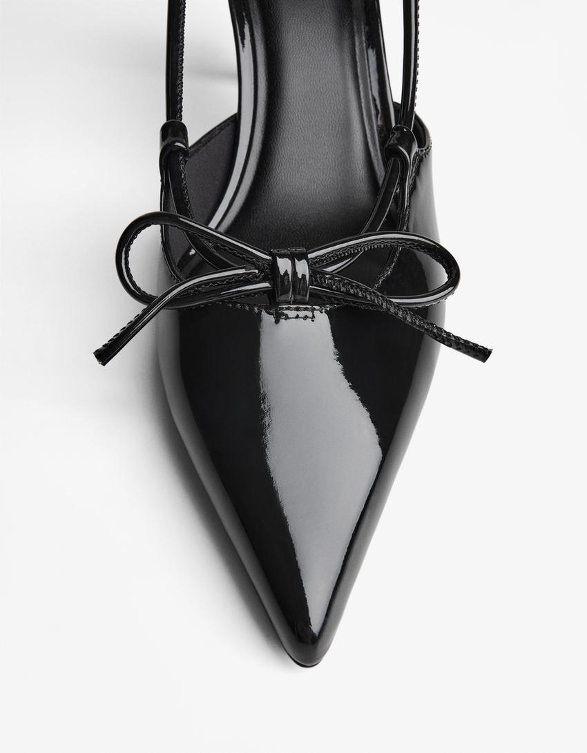 Pumps mit offener Ferse und Detail-Schwarz