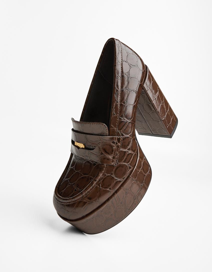 Gehakte mocassin met plateauzool-Bruin