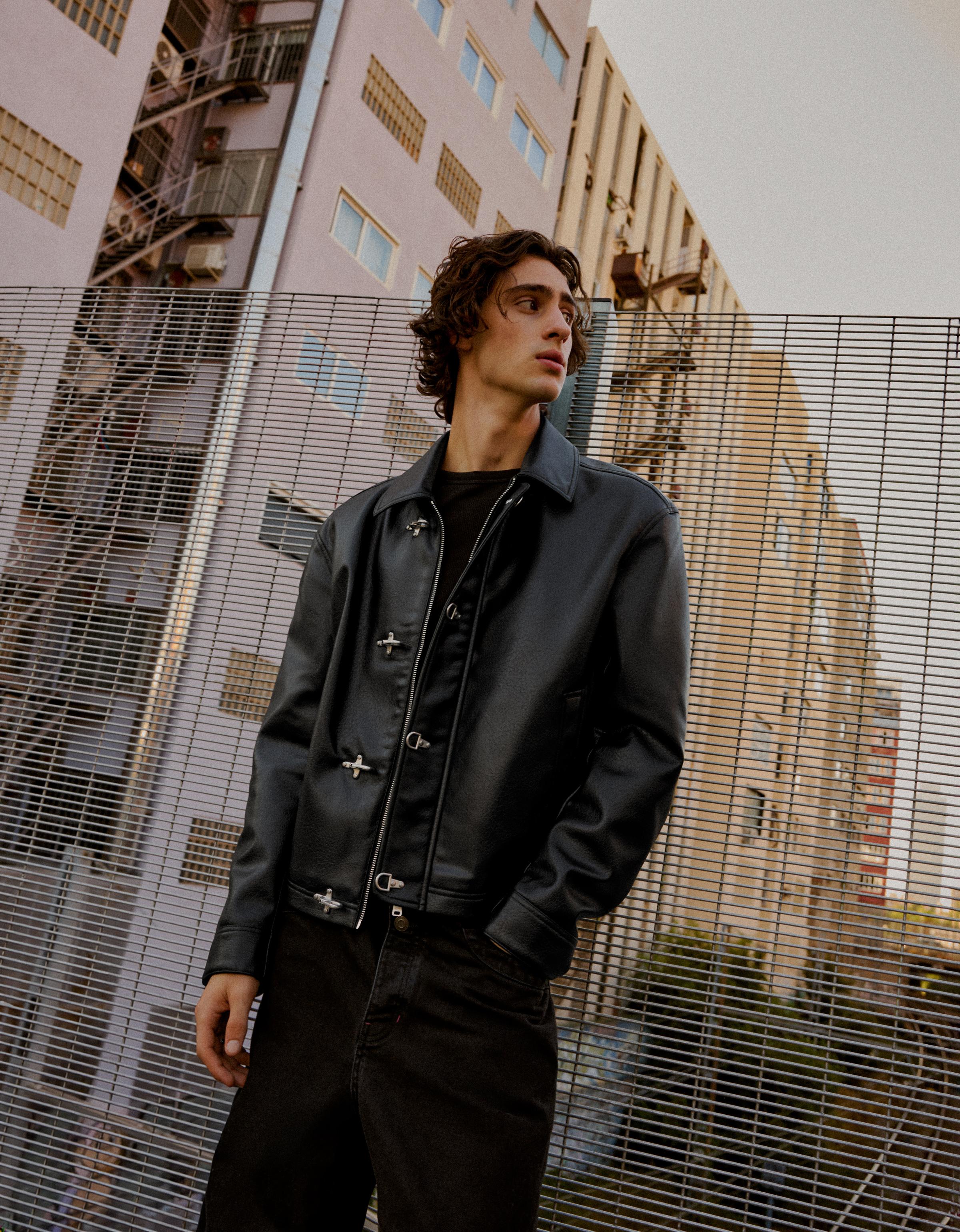 Leather effect jacket with clasps — Black