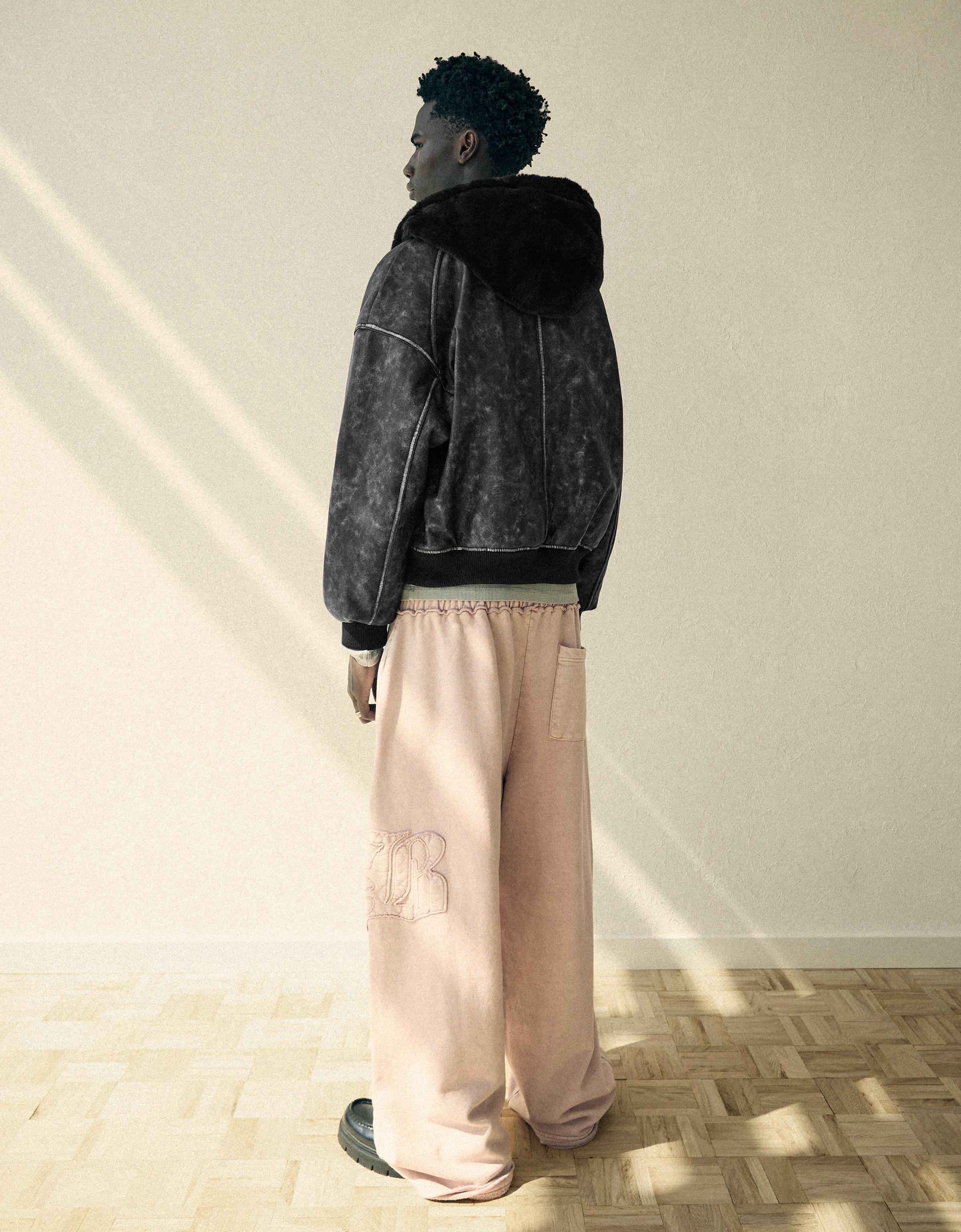 Reversible faux fur hooded jacket — Black