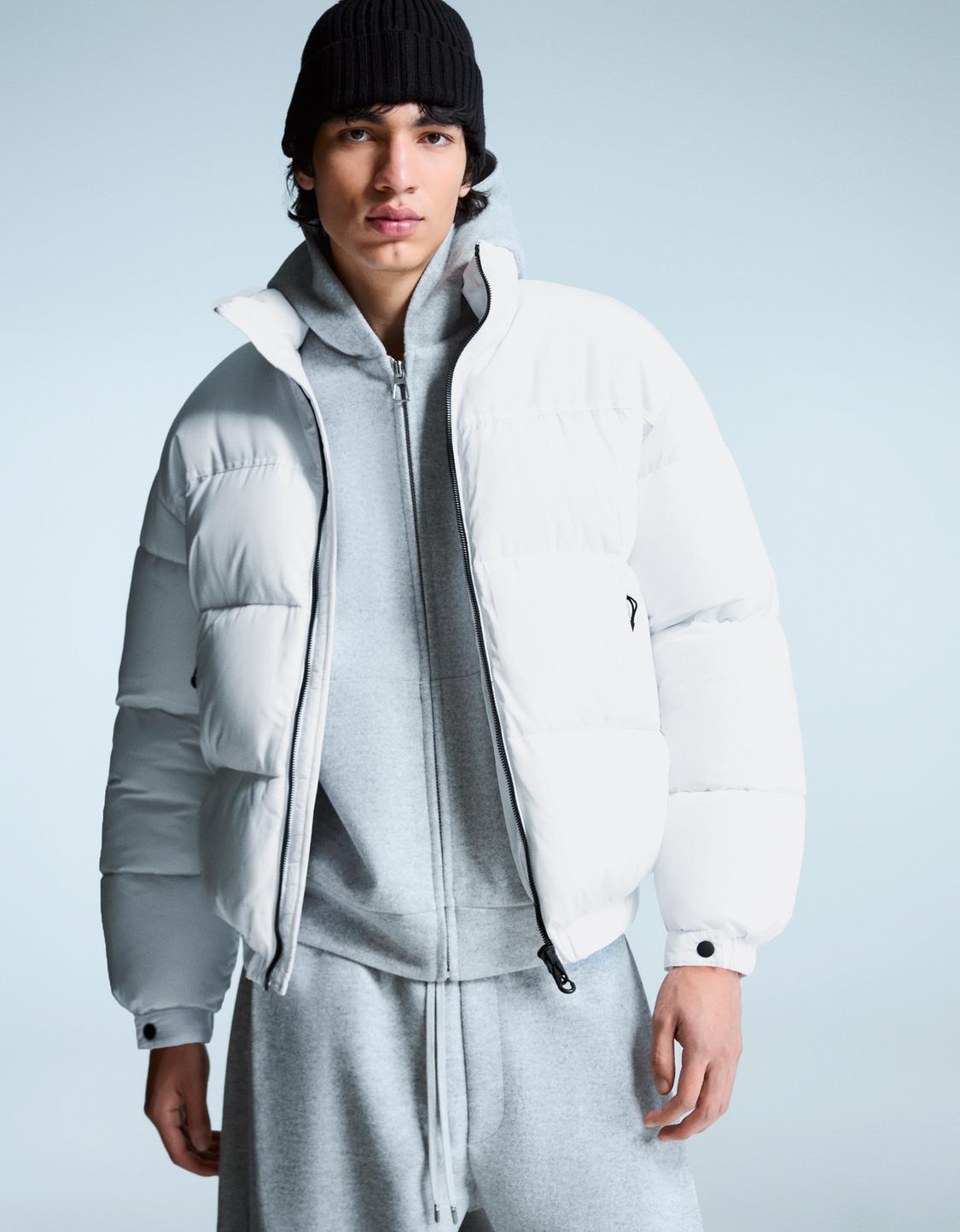 Technical puffer jacket
