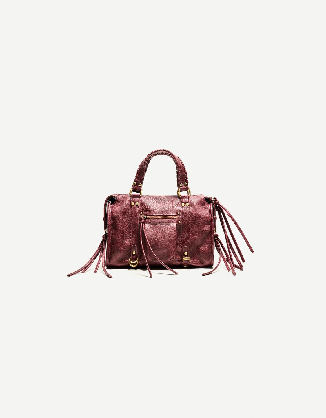 Worn-effect bowling bag with straps