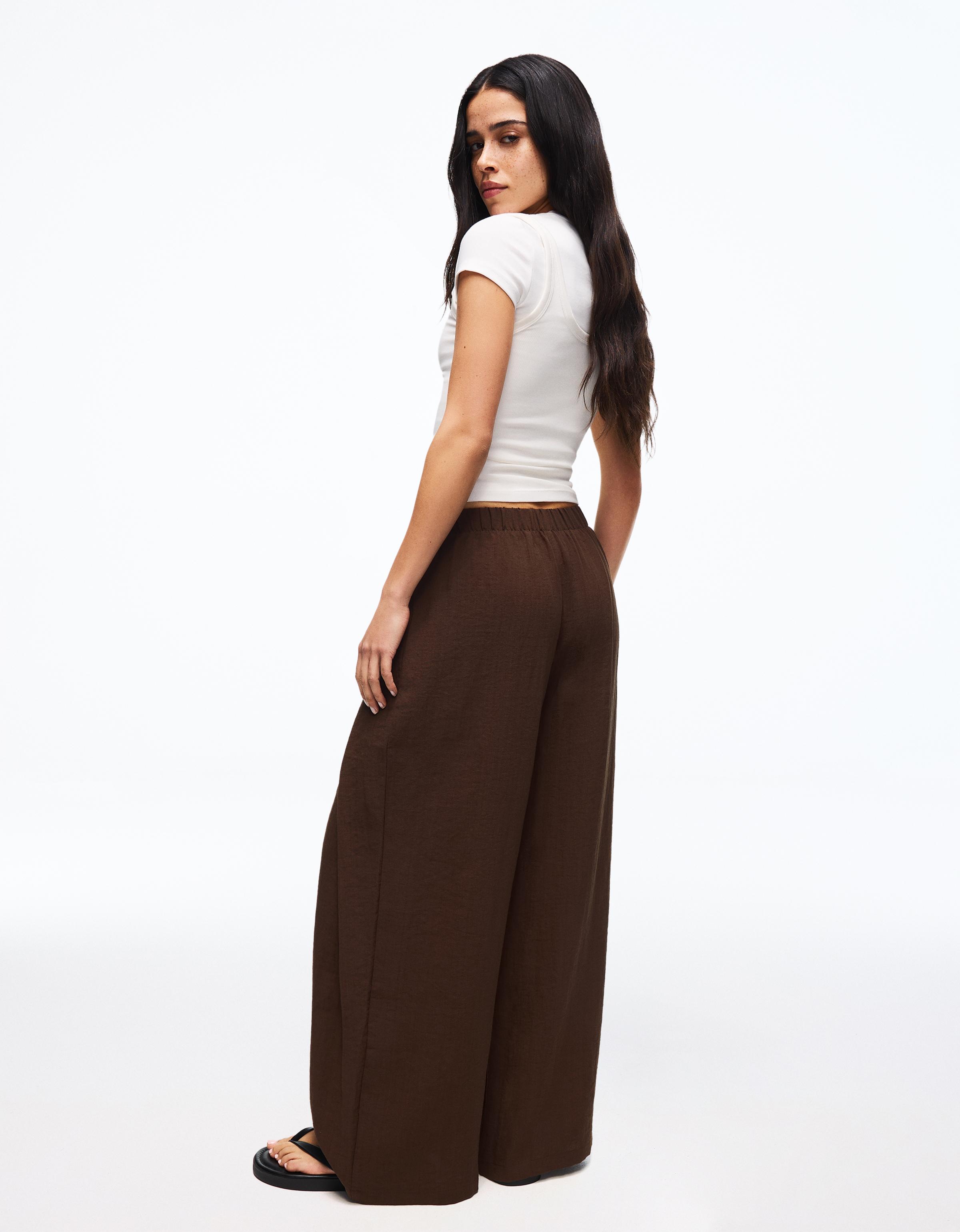 Rustic wide-leg pleated trousers — Brown