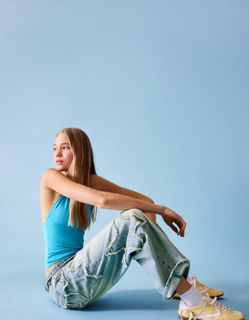 Low-rise boyfriend jeans with stars-Light blue