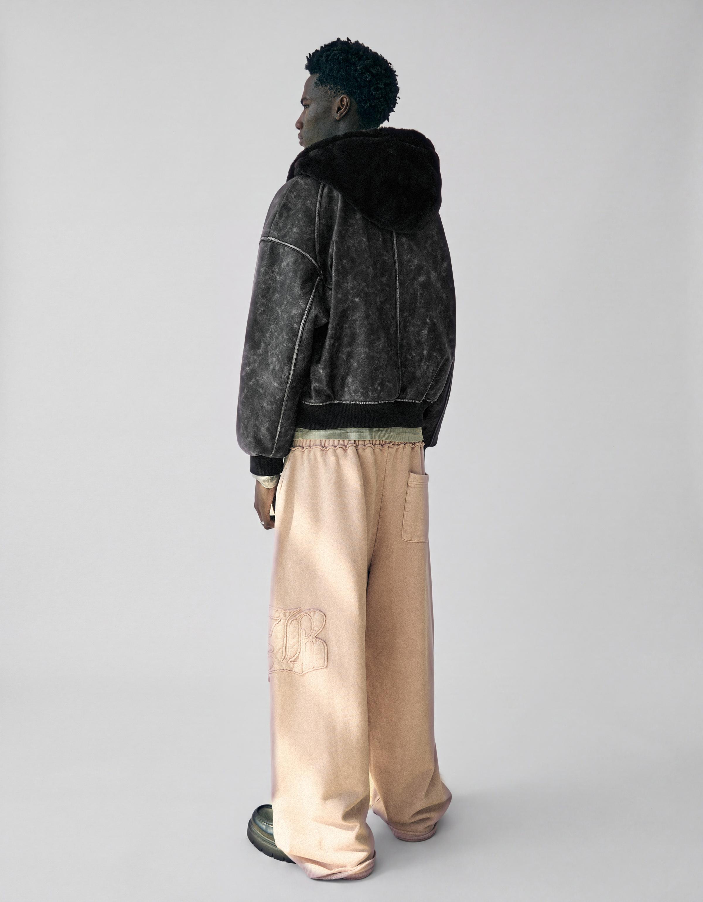 Reversible faux fur hooded jacket — Black