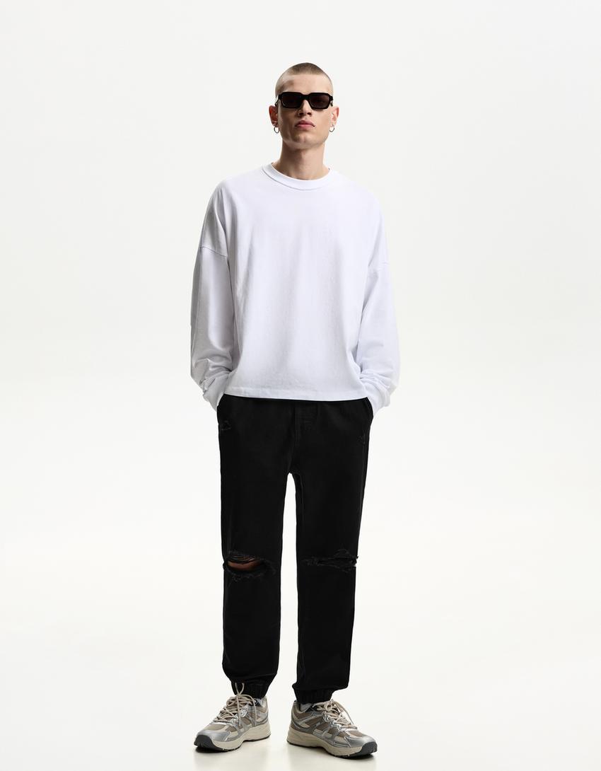 Jeans jogger rotos-Negro