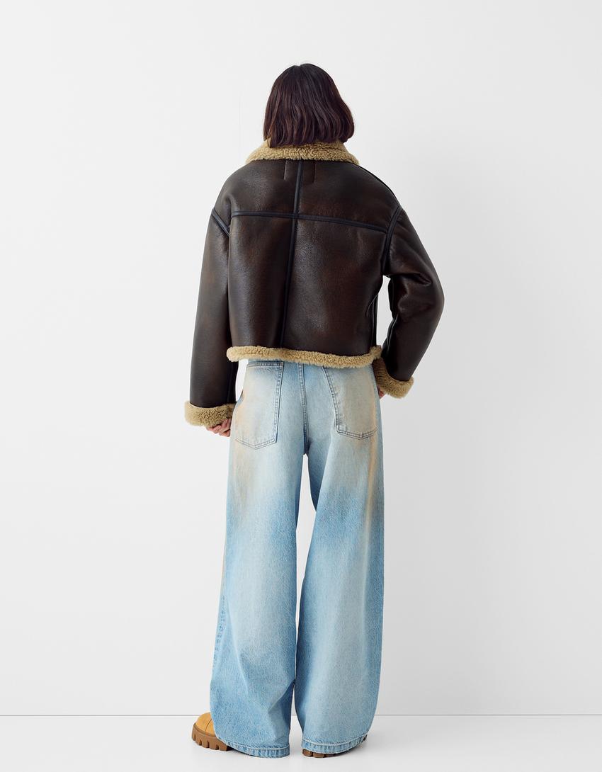 Distressed double-faced faux leather trucker jacket-Brown