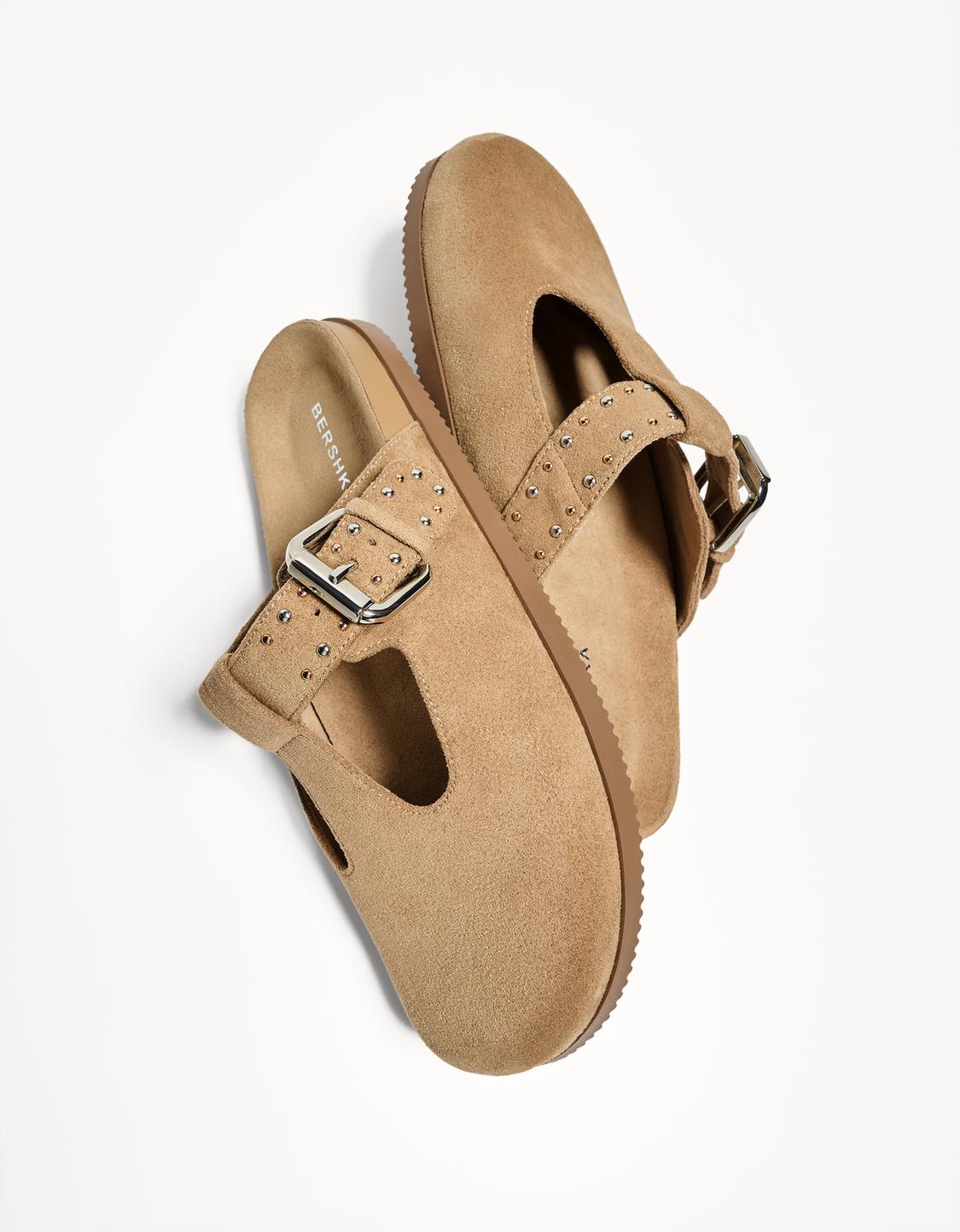Buckled clogs
