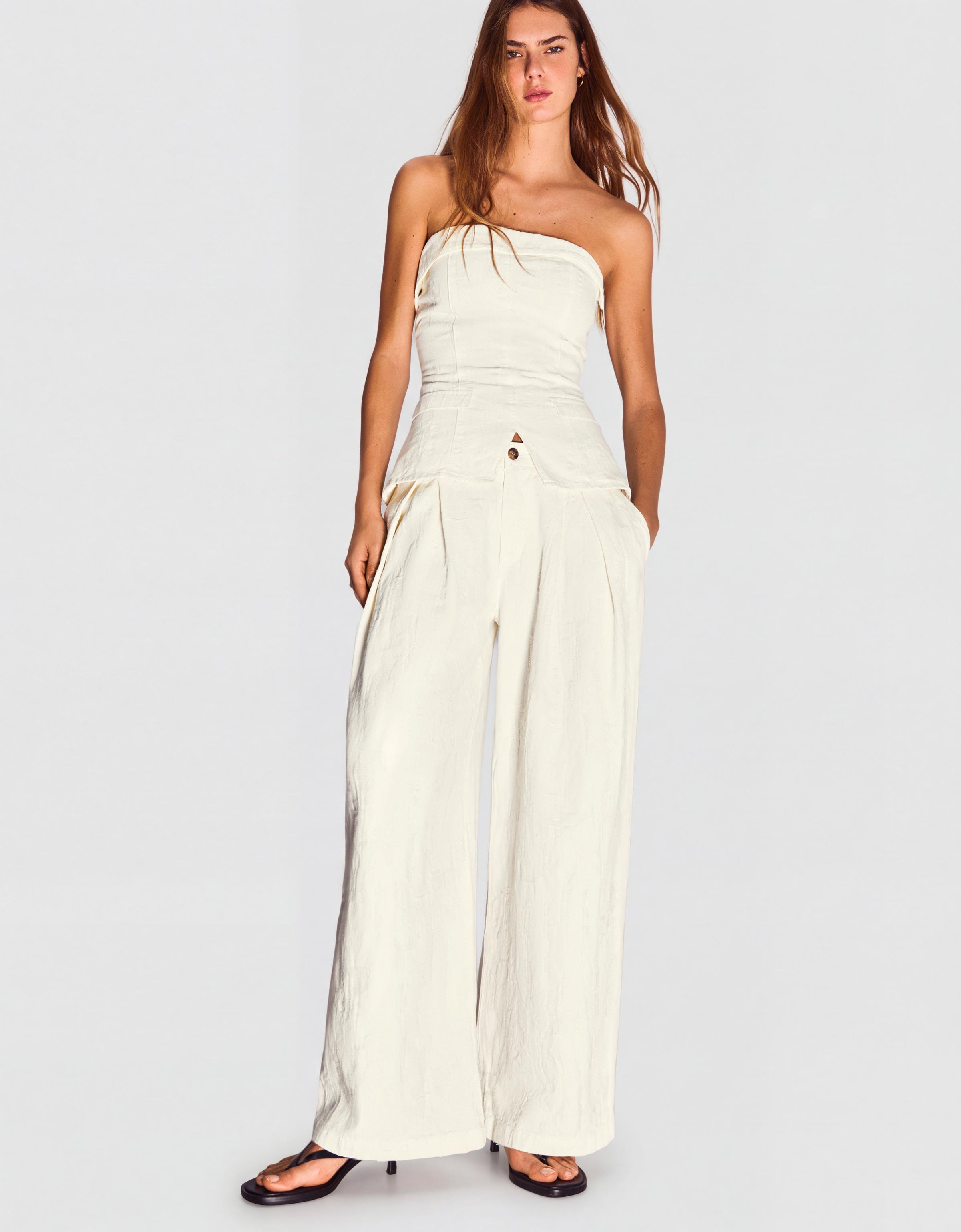 Low-rise wide-leg darted jeans