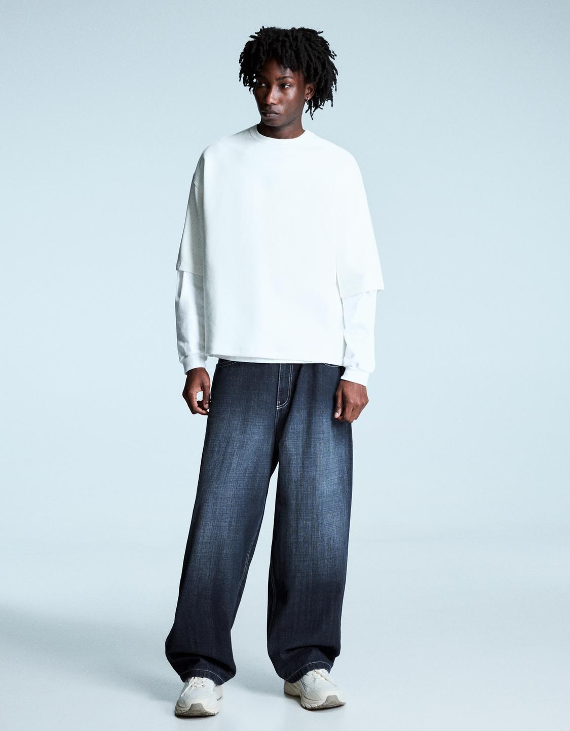 Jeans superbaggy parche tachas