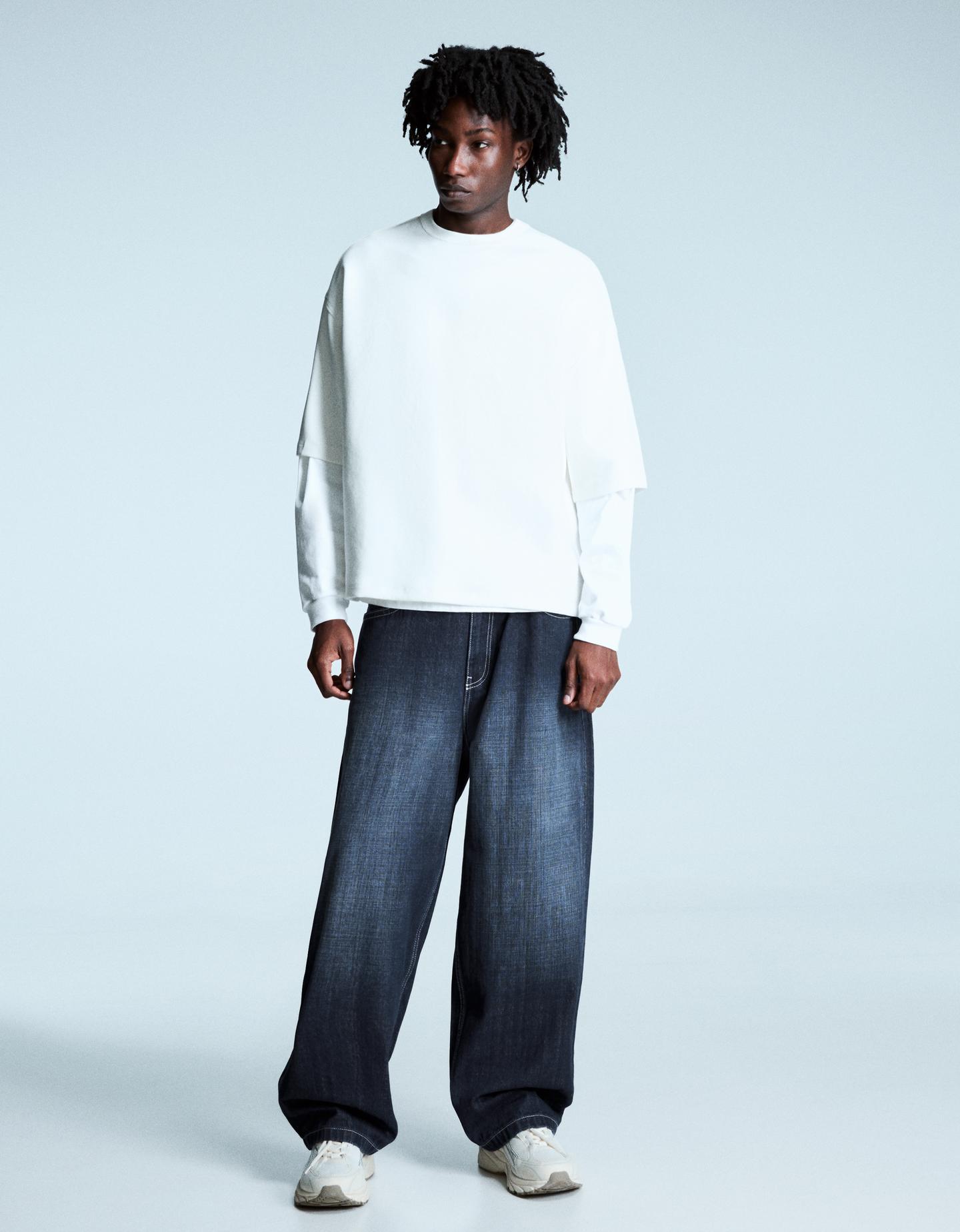 Bershka jeansy o kroju super baggy z naszywką i ćwiekami granatowy