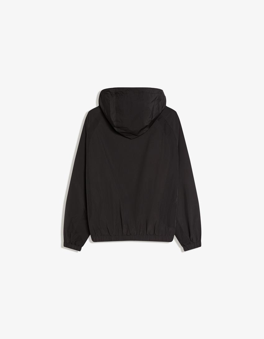 Cazadora técnica capucha-Negro