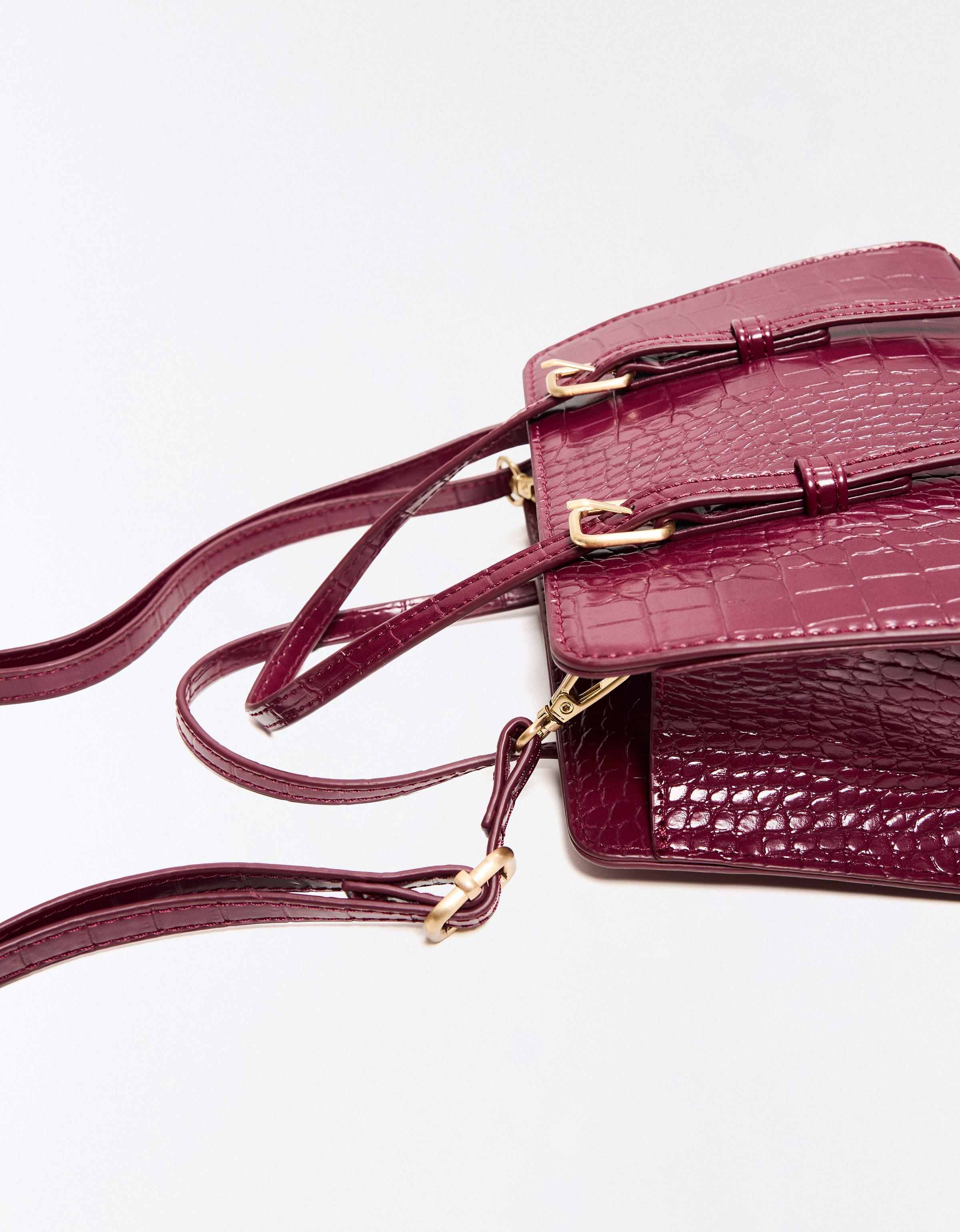 Textured box bag with buckles — Burgundy