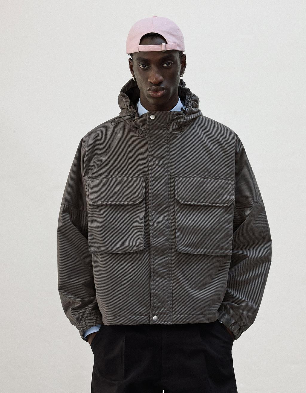 Bershka Technical boxy jacket with hood and pocket