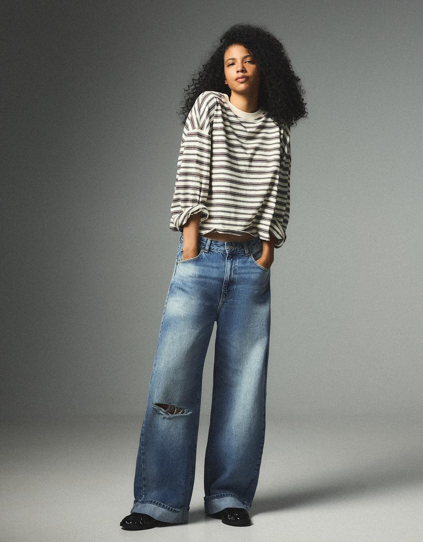 Balloon jeans with back buckle and rips-Light blue