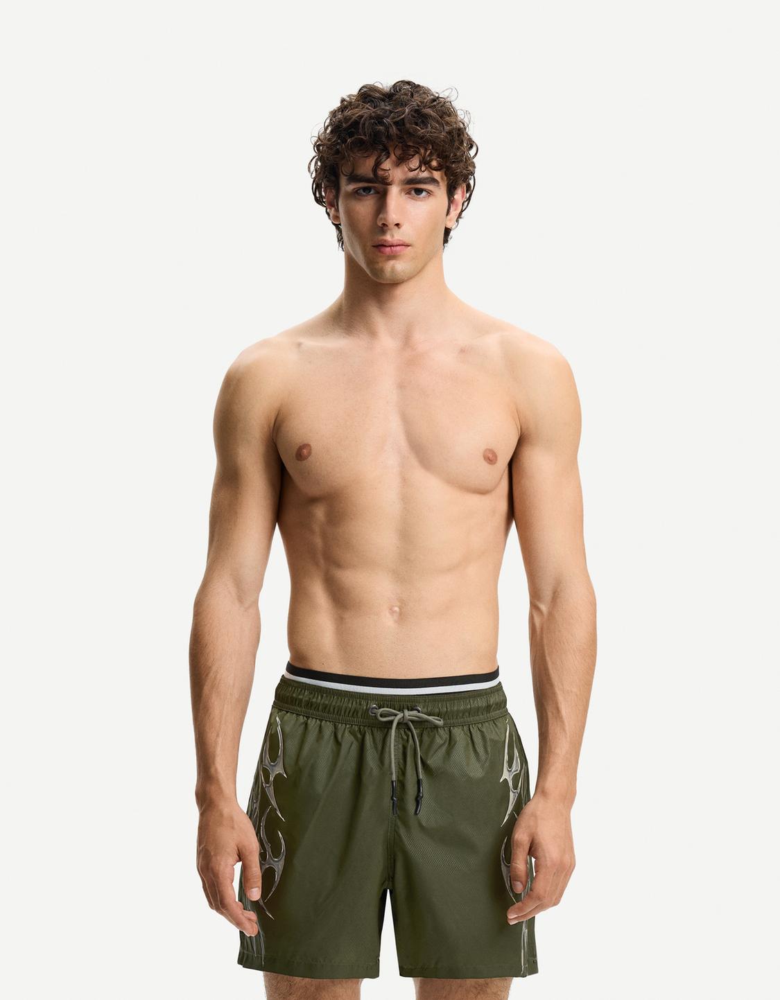 Swimming trunks with double waistband and print
