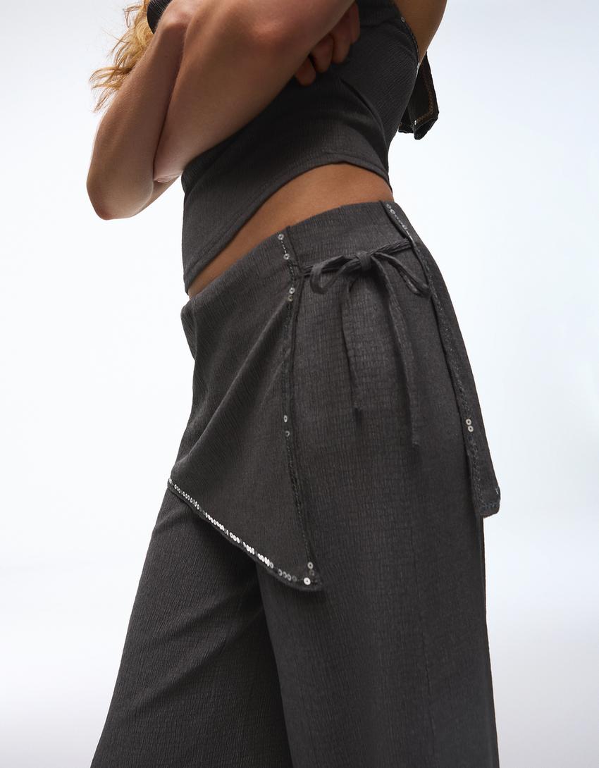 Pantalón con sobre falda lentejuelas-Gris oscuro