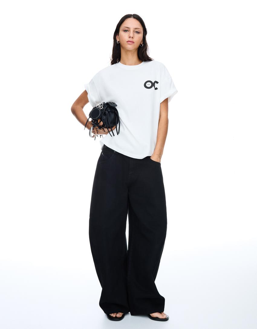 Kortärmad t-shirt med O.C. California-tryck-Benvit