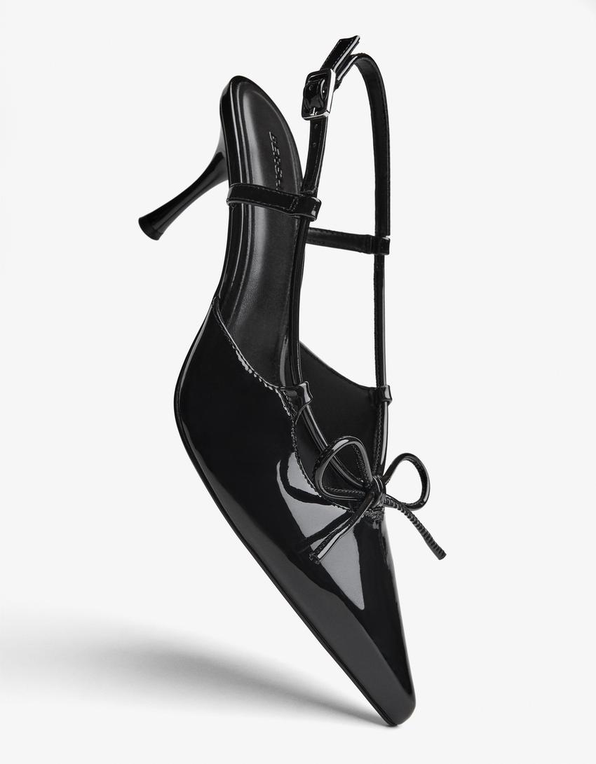 Pumps mit offener Ferse und Detail-Schwarz