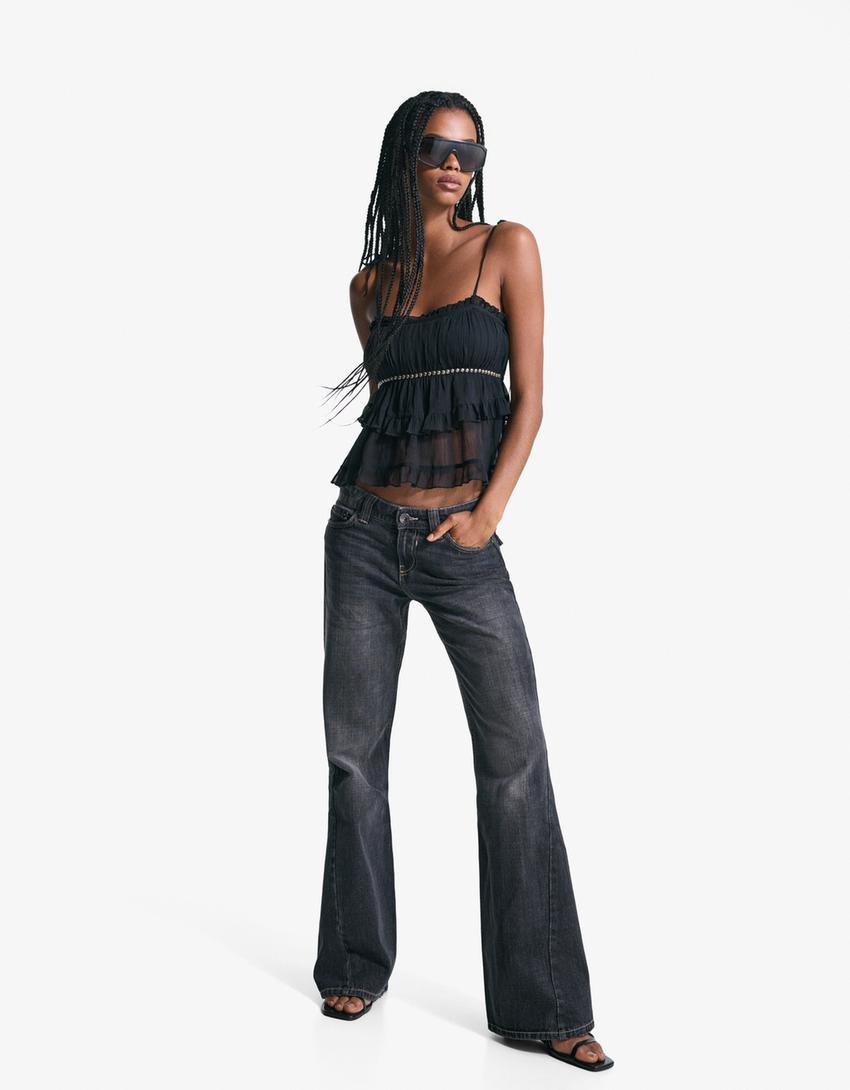 Rustieke top met bandjes en studs-Zwart