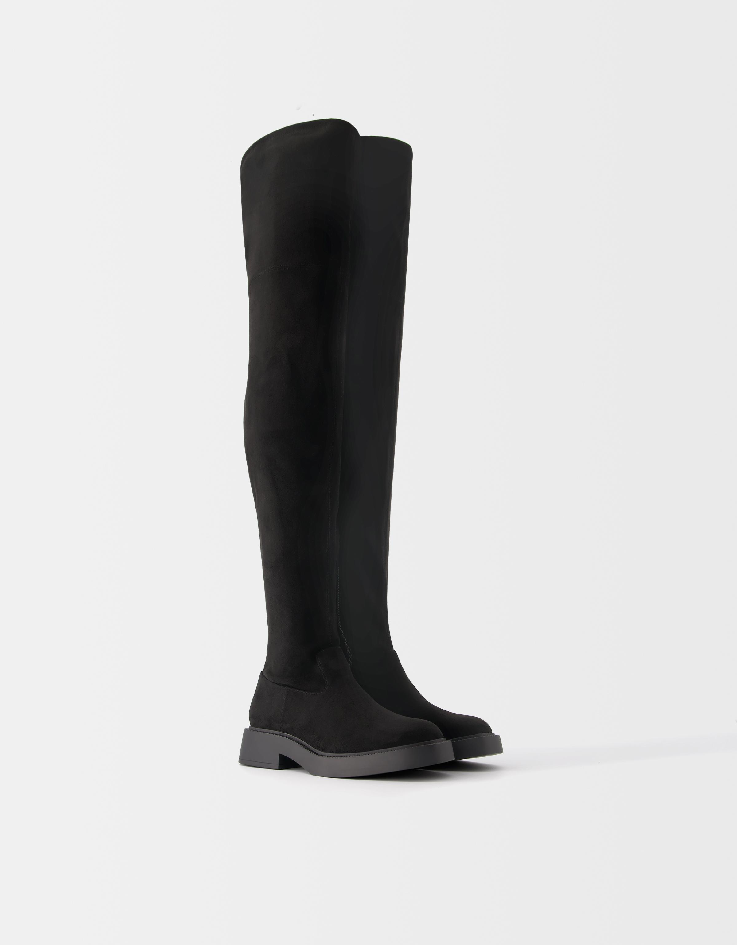 Flat fitted knee high boots Shoes Women Bershka