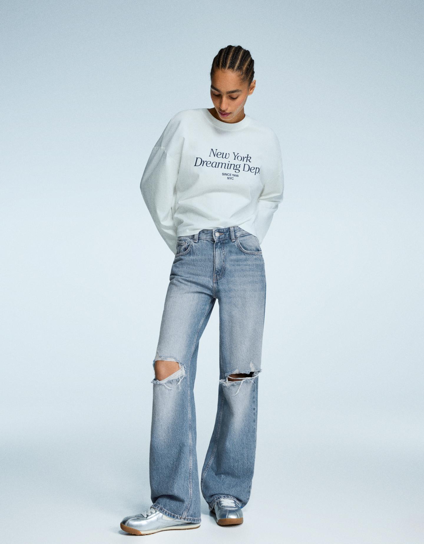 Bershka jeansy wide leg z dziurami wyblakły niebieski