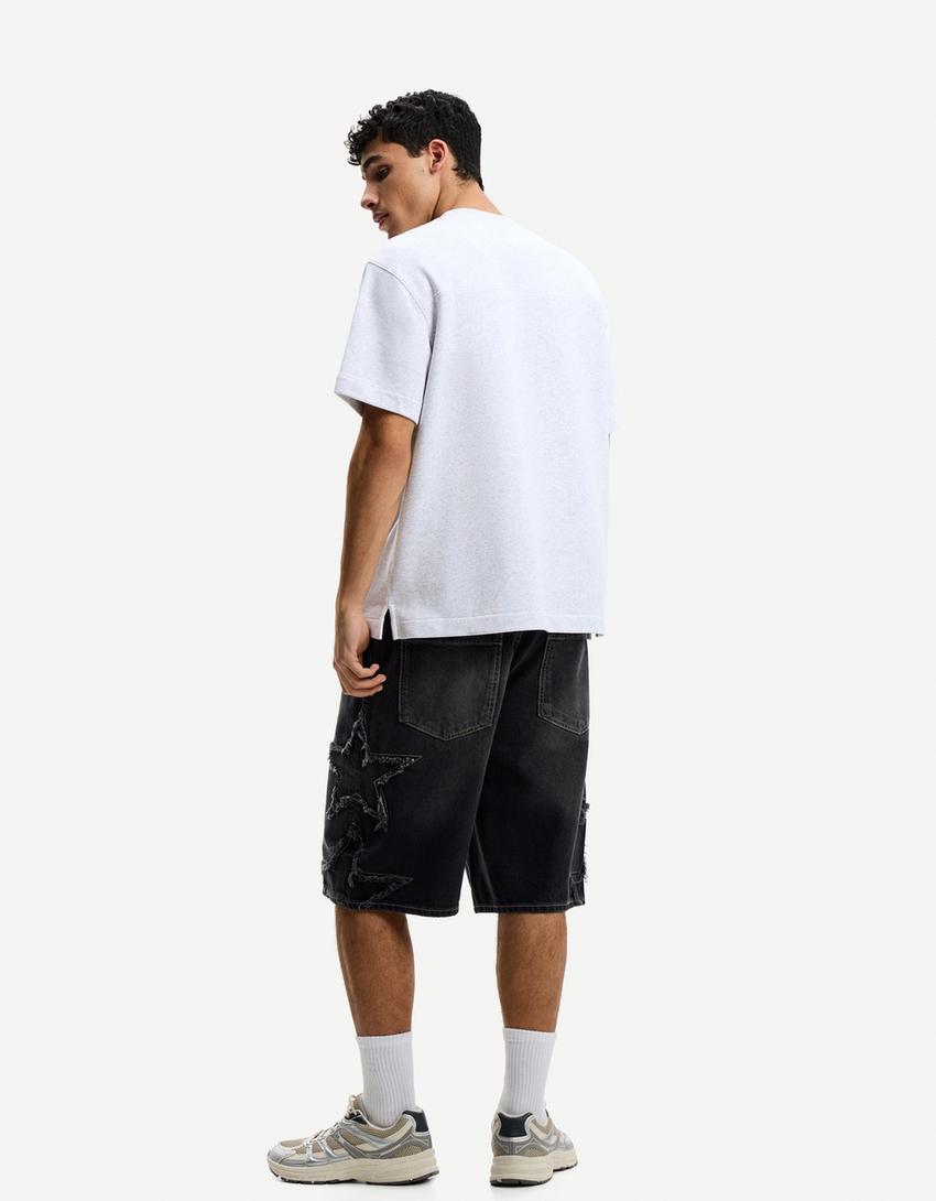 Baggy Bermuda shorts with patches
