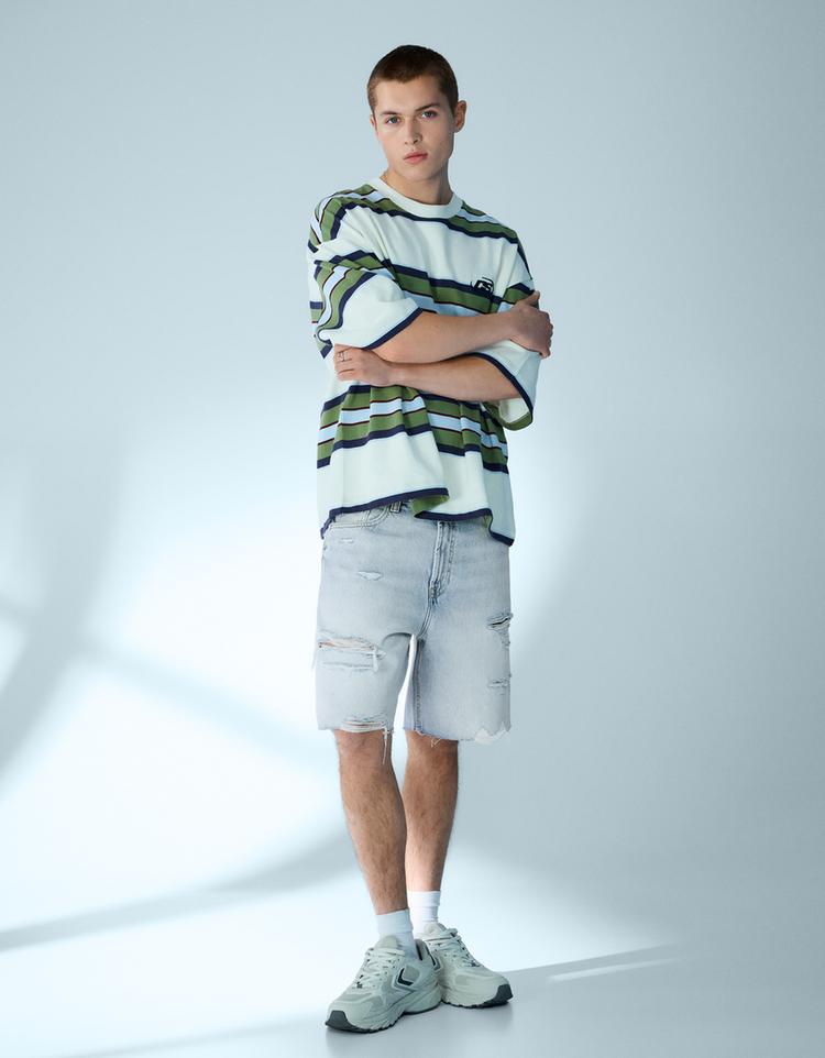 Ripped denim Bermuda shorts — Light blue