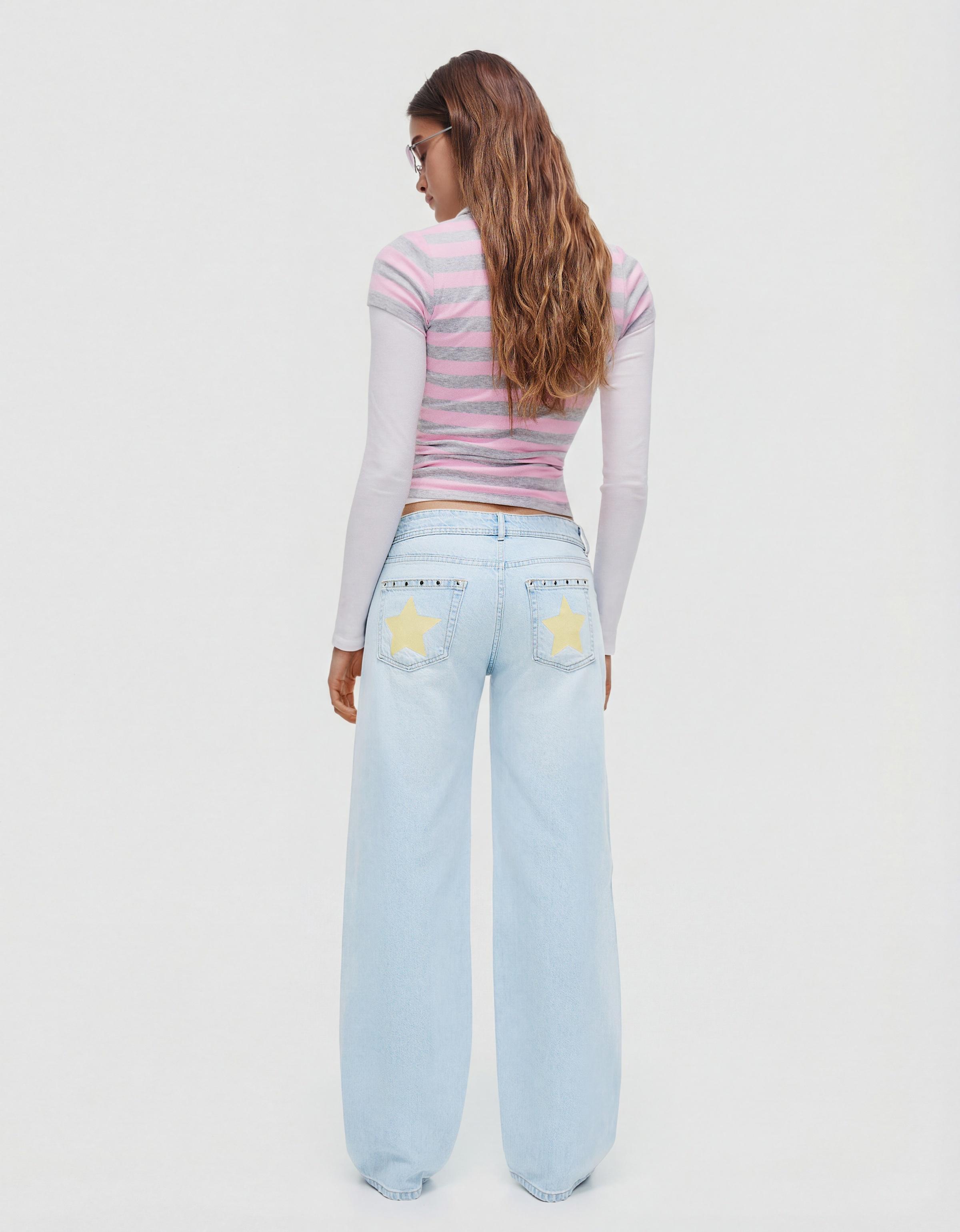 Low-rise baggy studded jeans